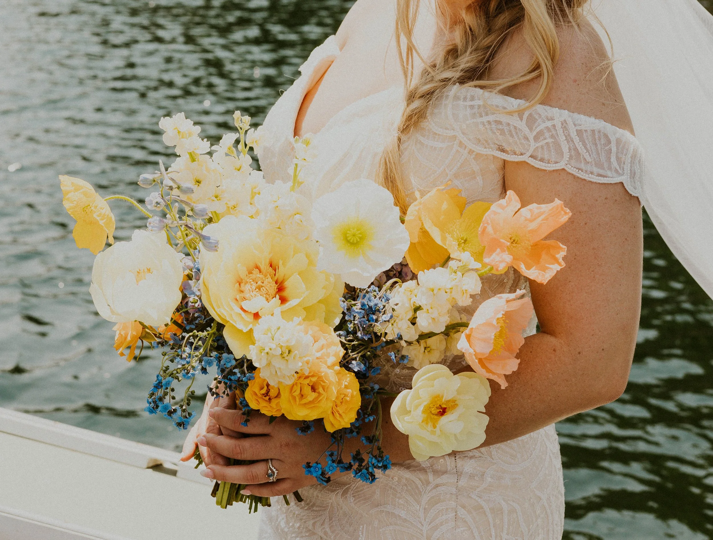 Bridal bouquet detail shot, yellow poppies
