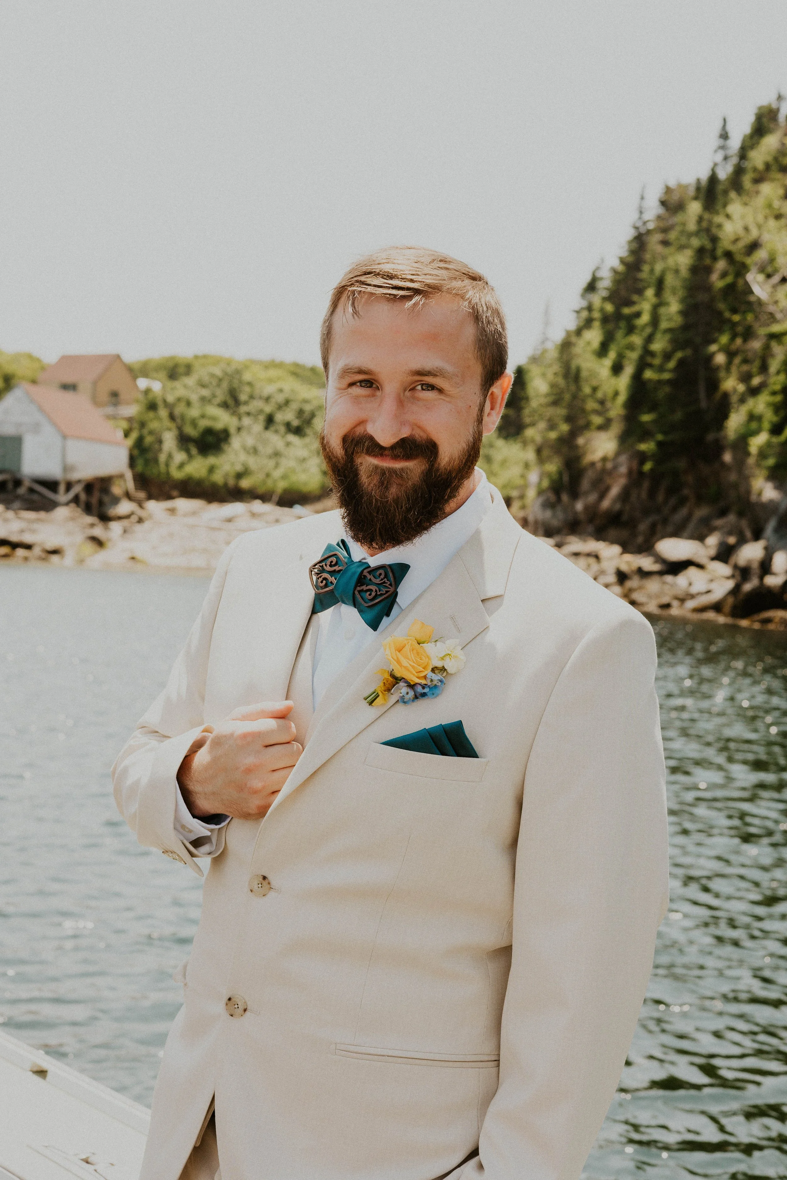Maxwell in his suit and boutonniere