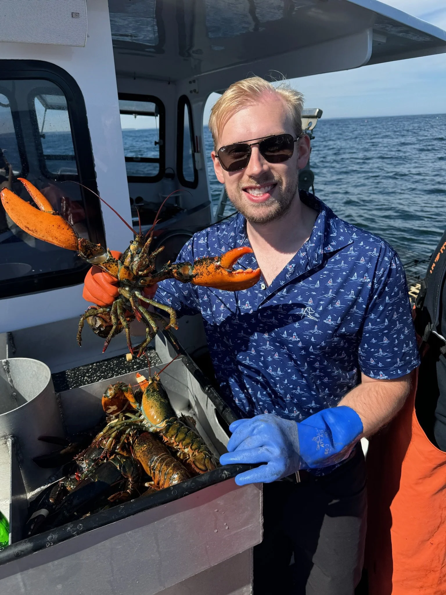 hauling lobster traps during Maine adventure elopement