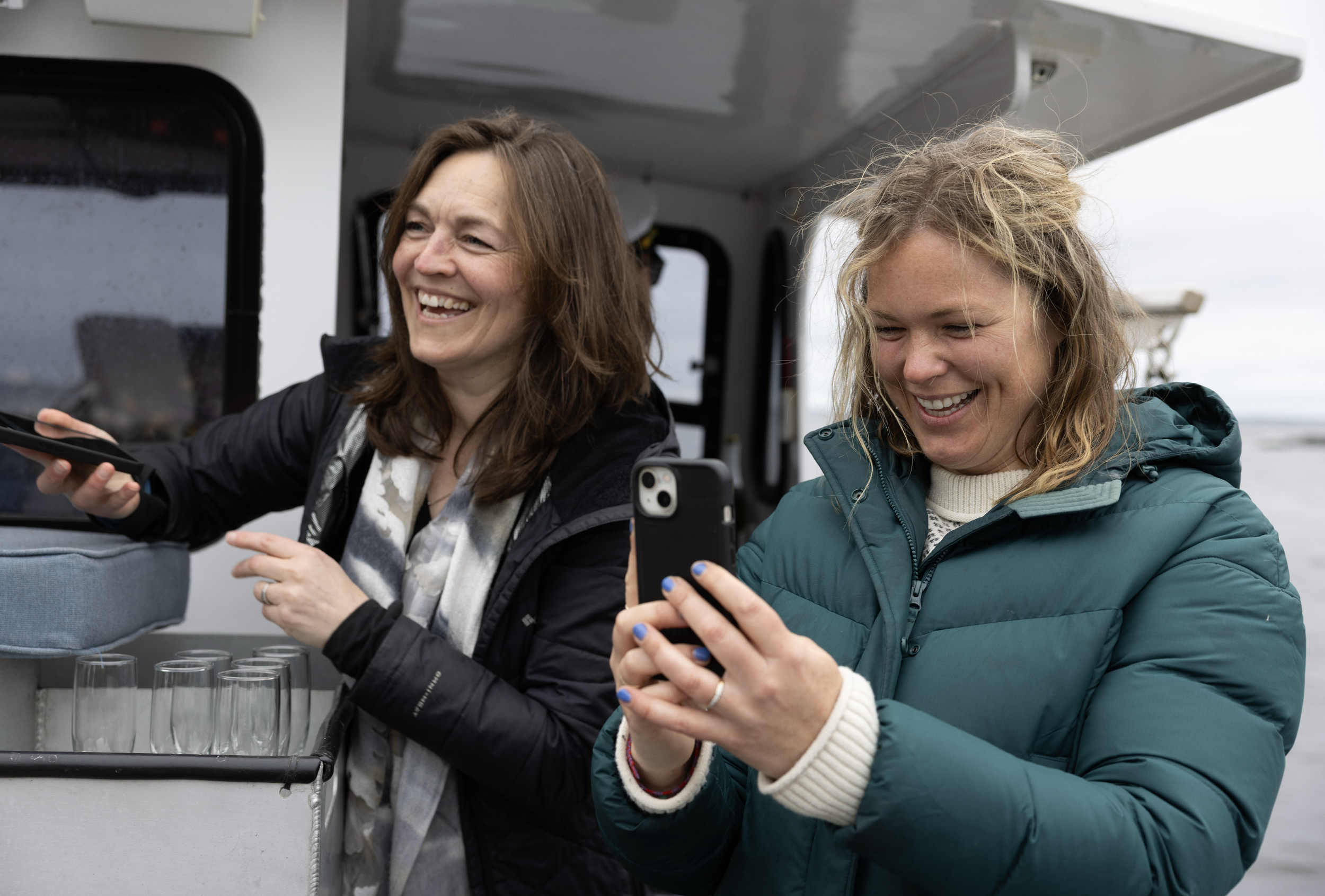 crew standing by taking photos of couple getting married