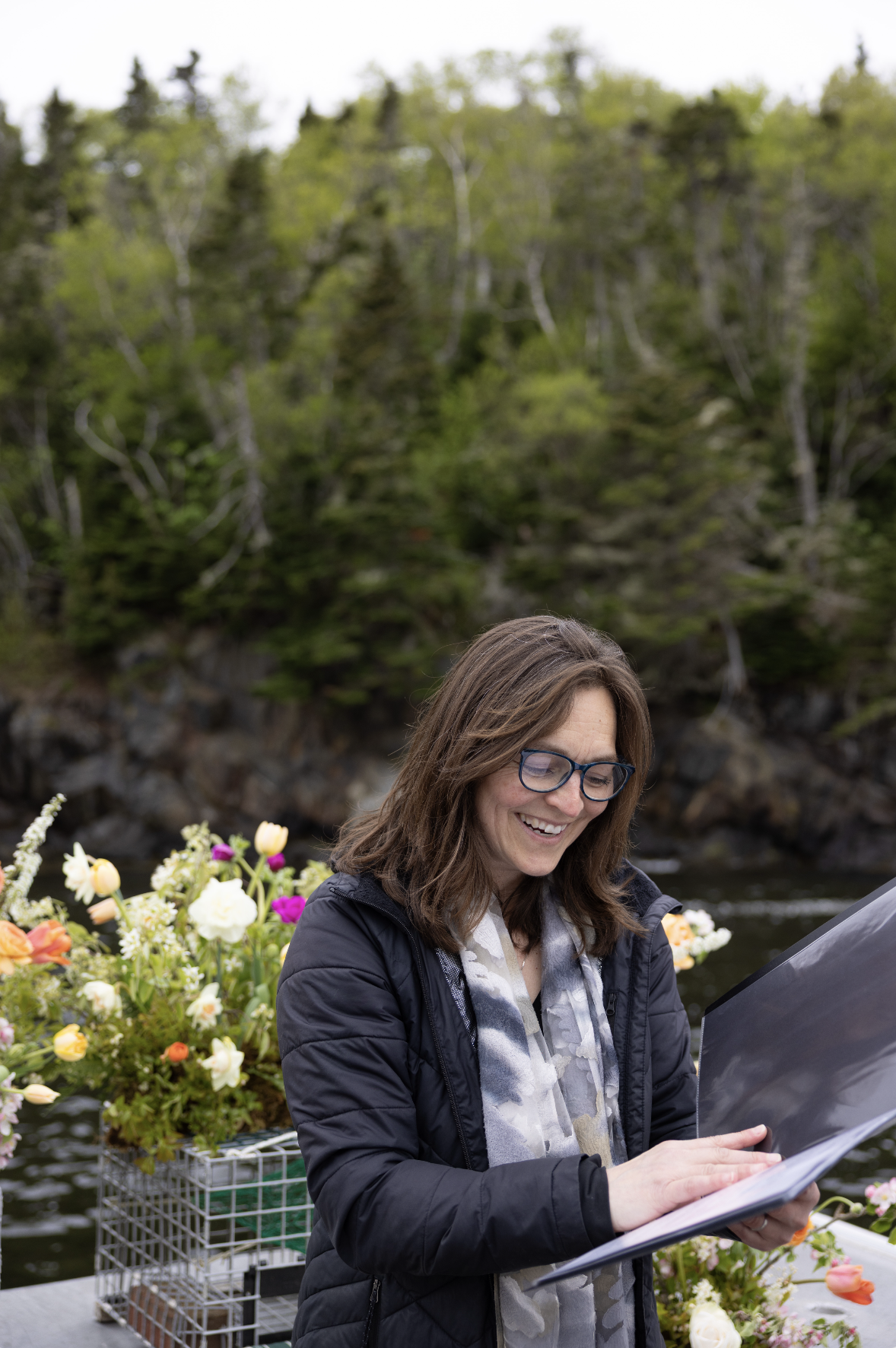 officiant preparing for intimate wedding ceremony on the boat