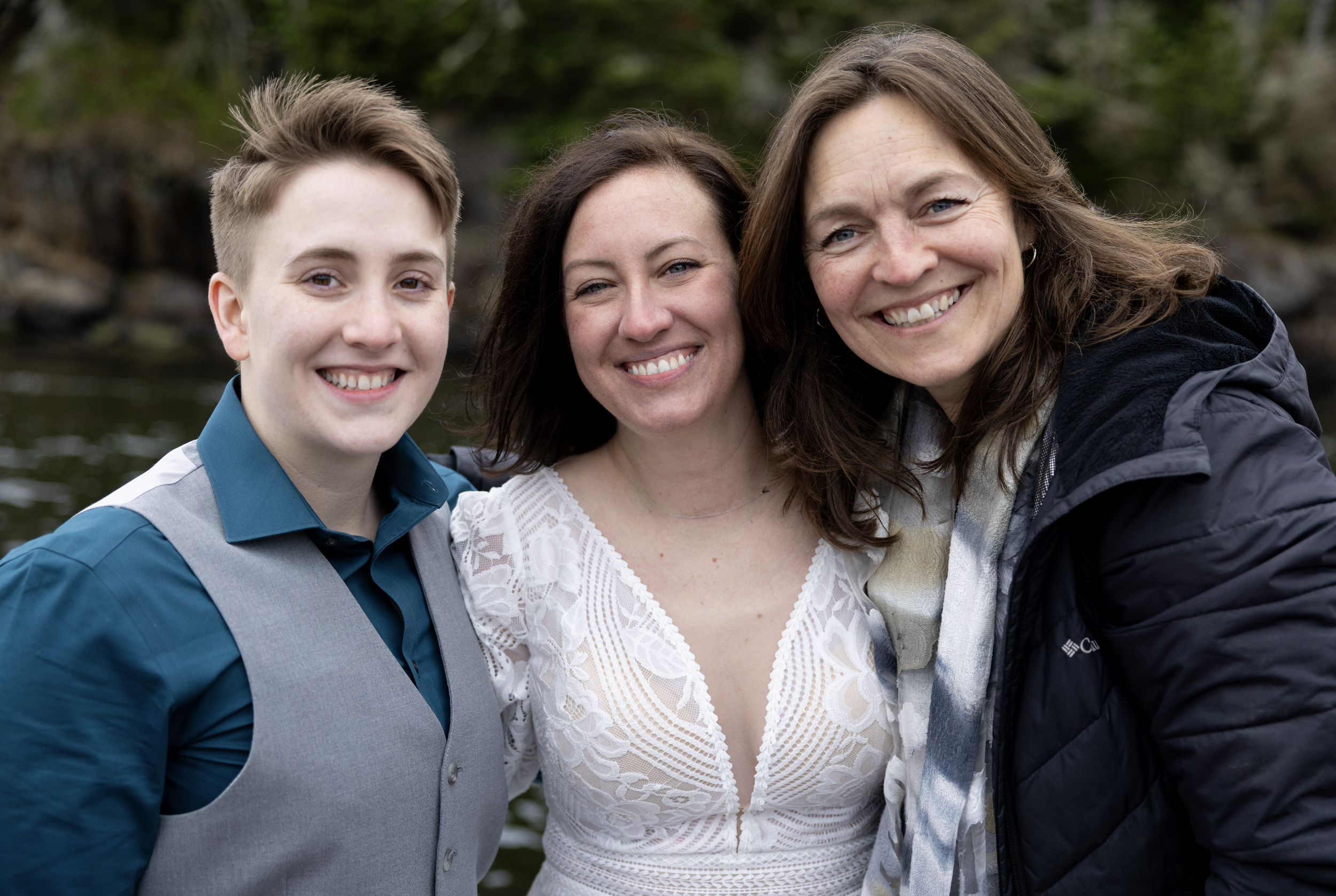 officiant with the happy couple married in midcoast maine