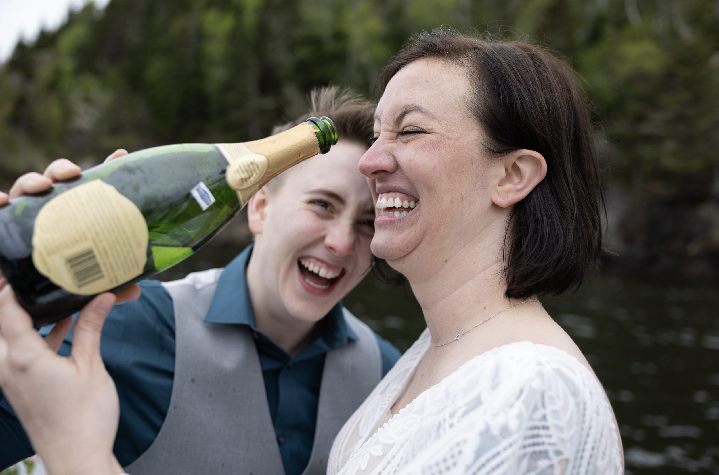drinking champagne bottle during maine's elopement charter boat