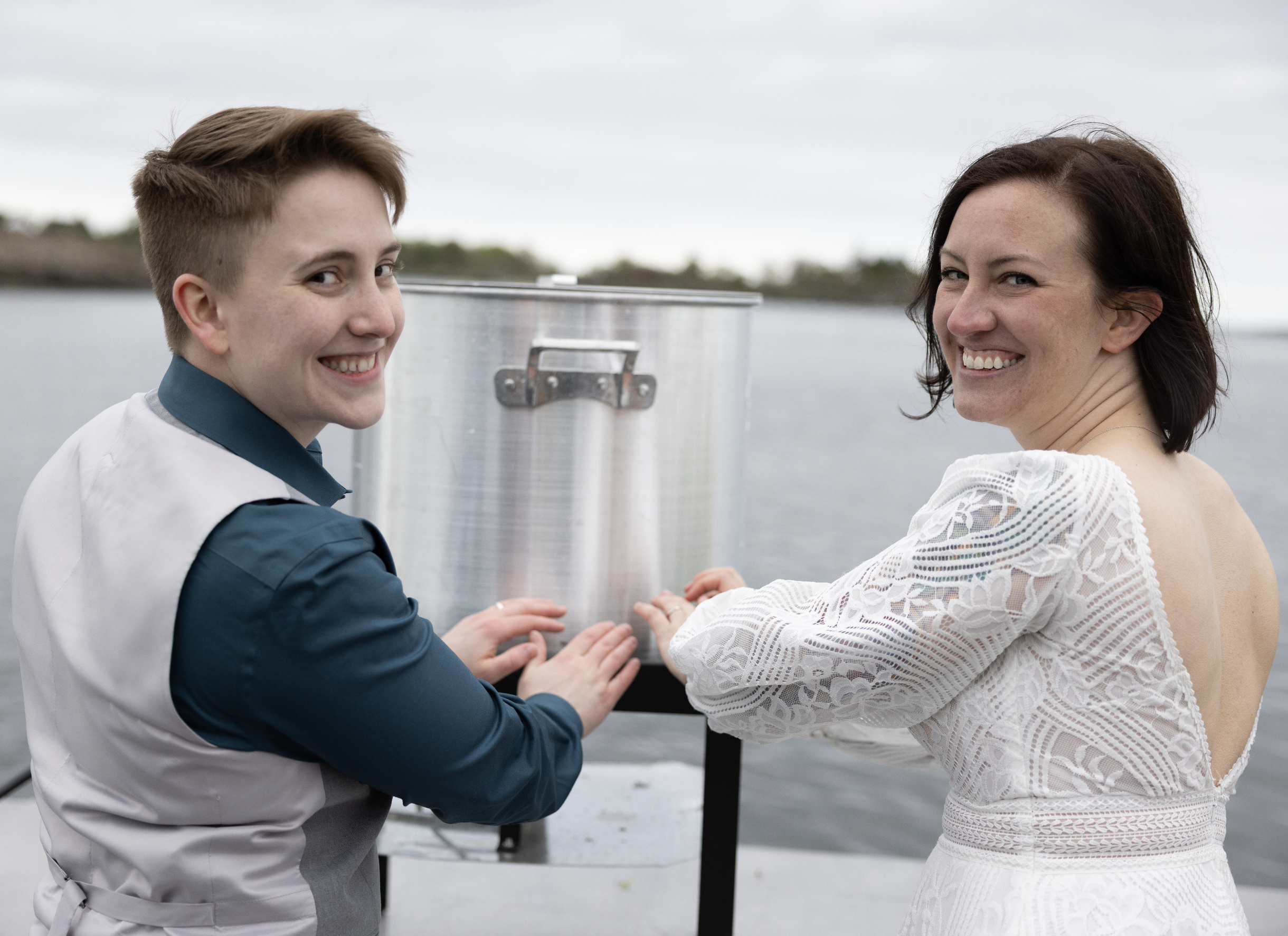 warming hands up on a cold day in May in Maine