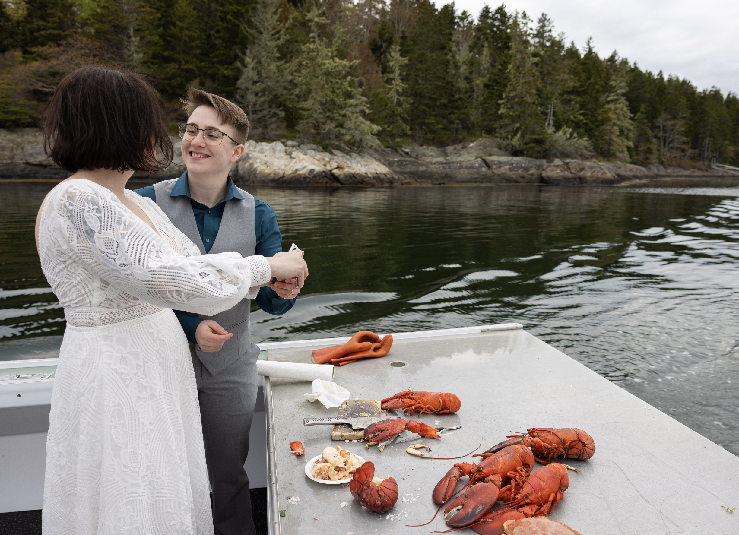 lobster bake celebration on boat after Seguin Island elopement