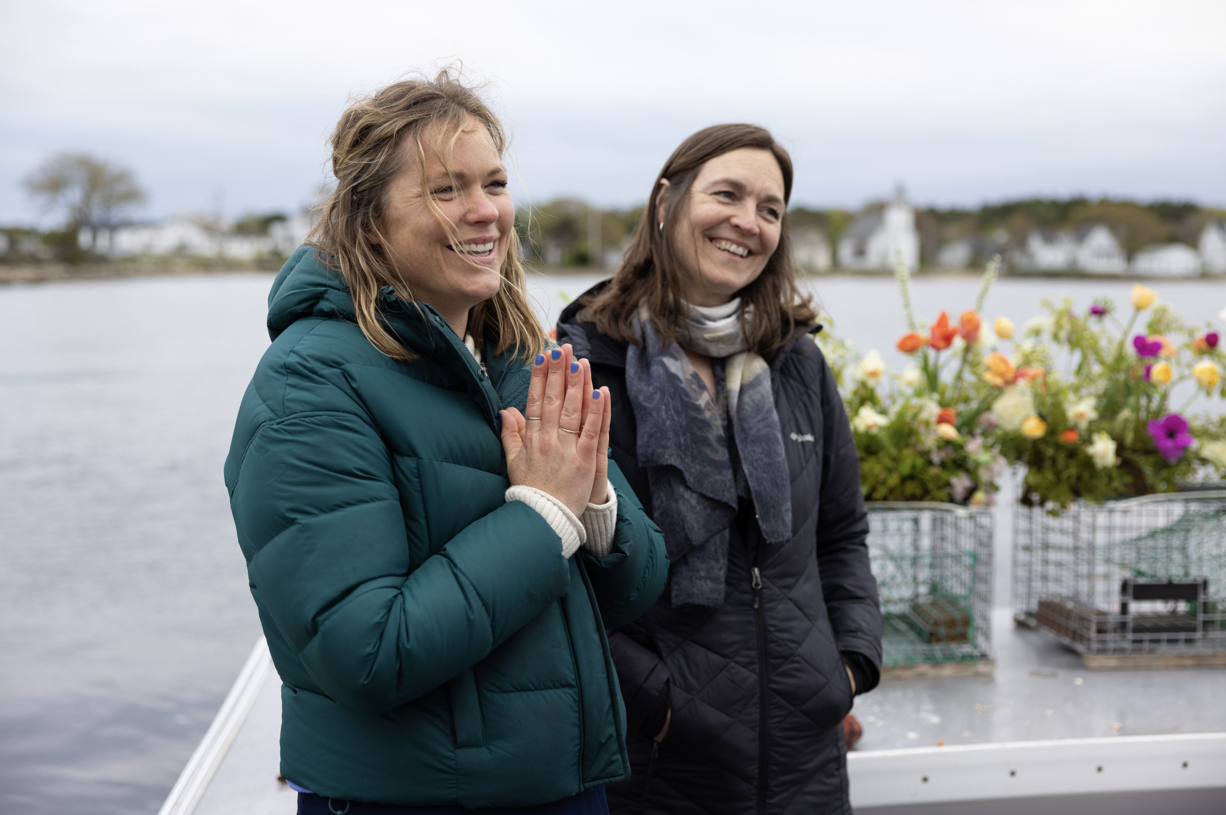 charter crew sharing lobster on boat after oceanfront vows