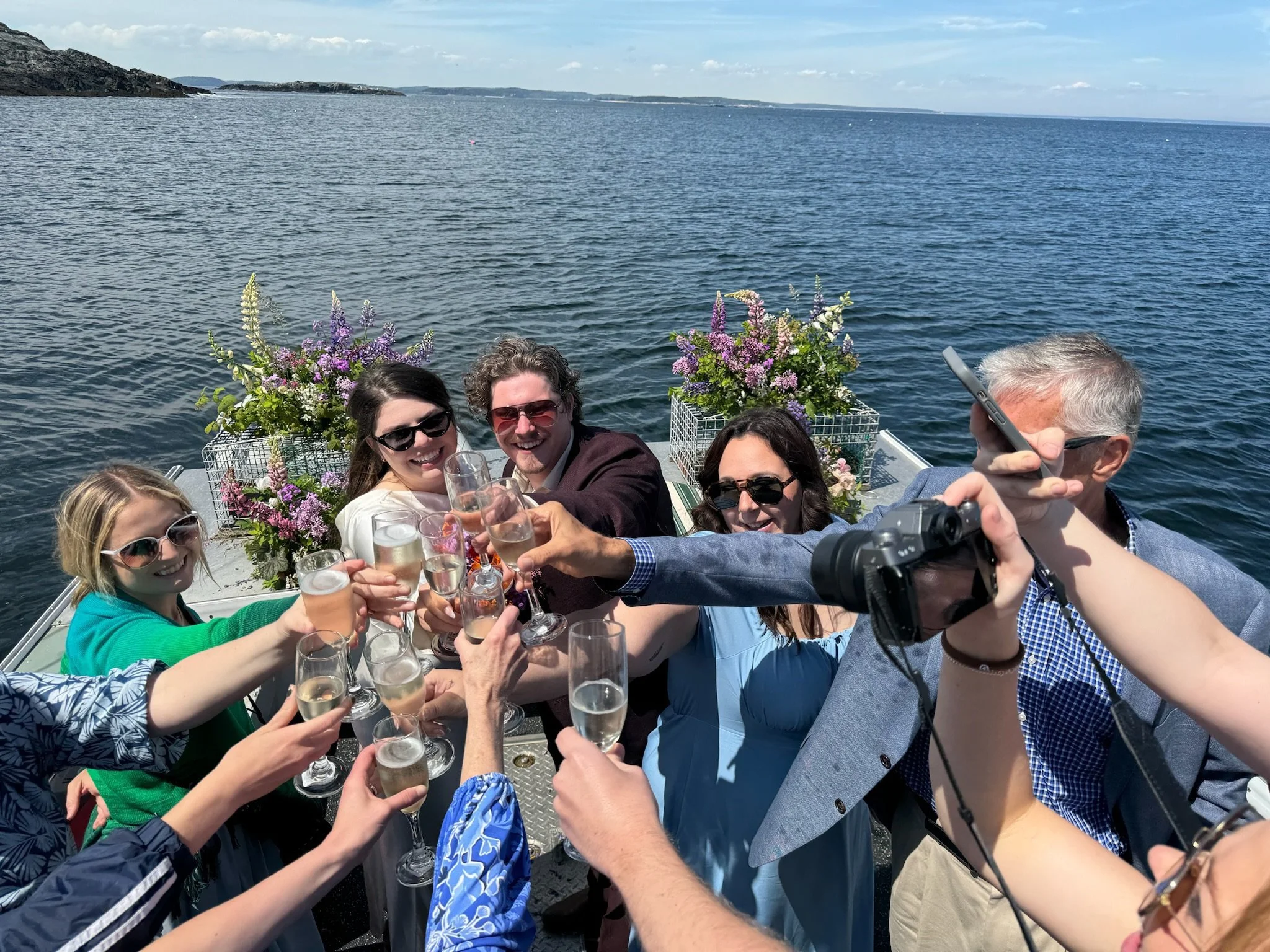 wedding guests celebrating after Seguin Island Maine elopement ceremony