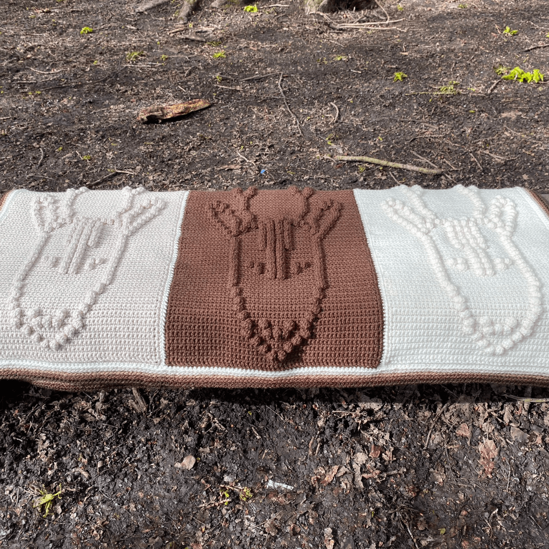 roe deer blanket on bench square tiny.png