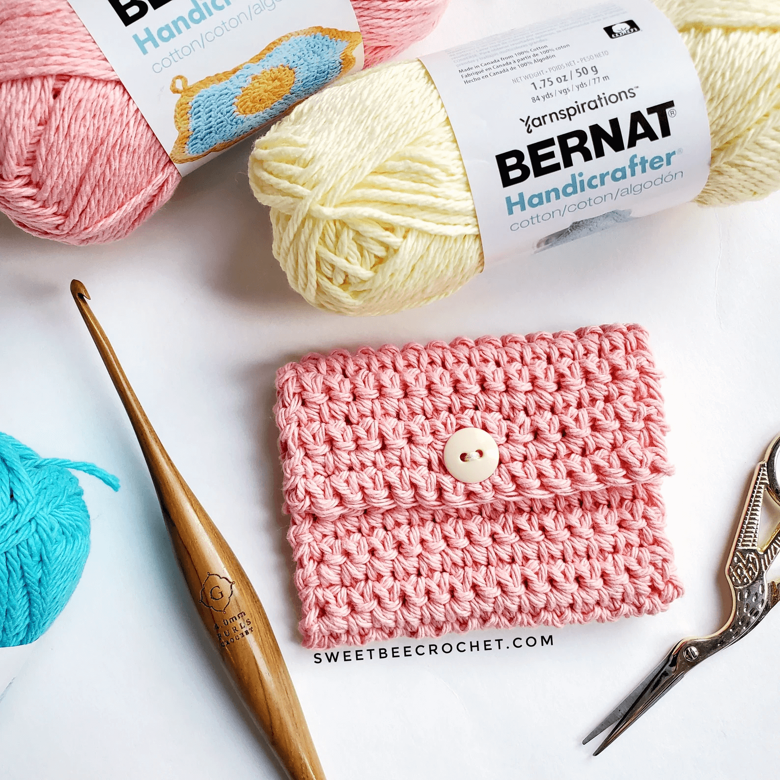 magnifient mini pouch, sweet bee crochet shop png tiny.png