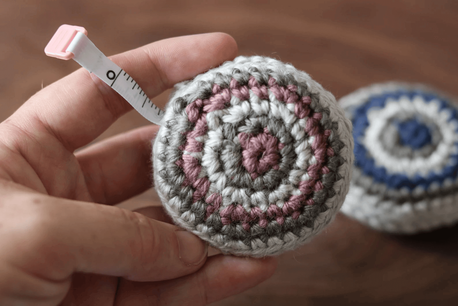 retro measuring tape cover by rich textures crochet png.png