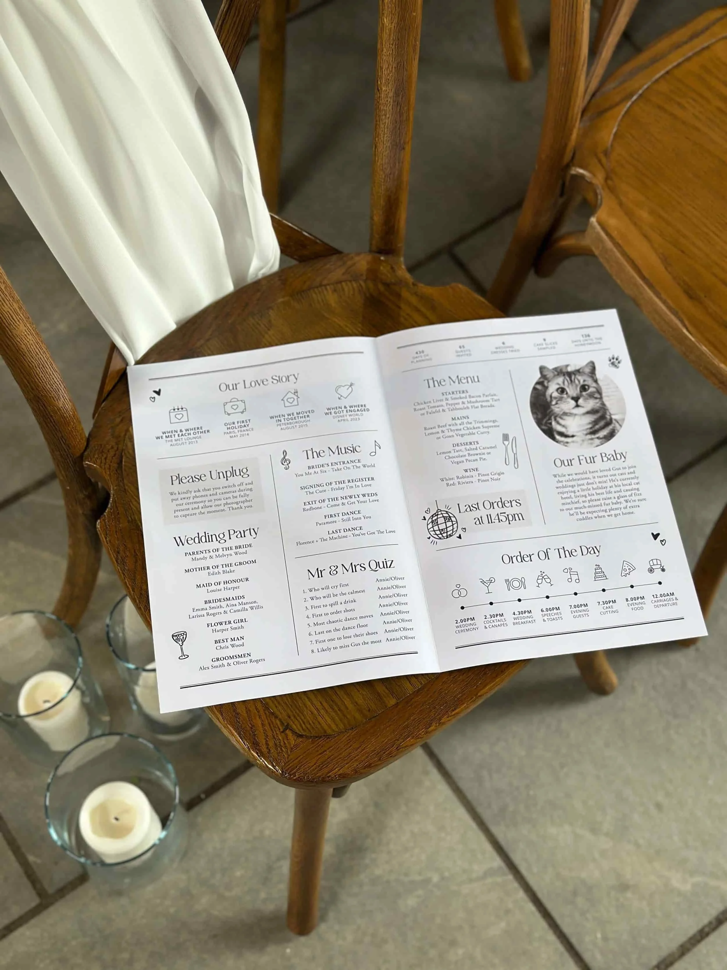 The inside of a black and white wedding newspaper on a ceremony chair.