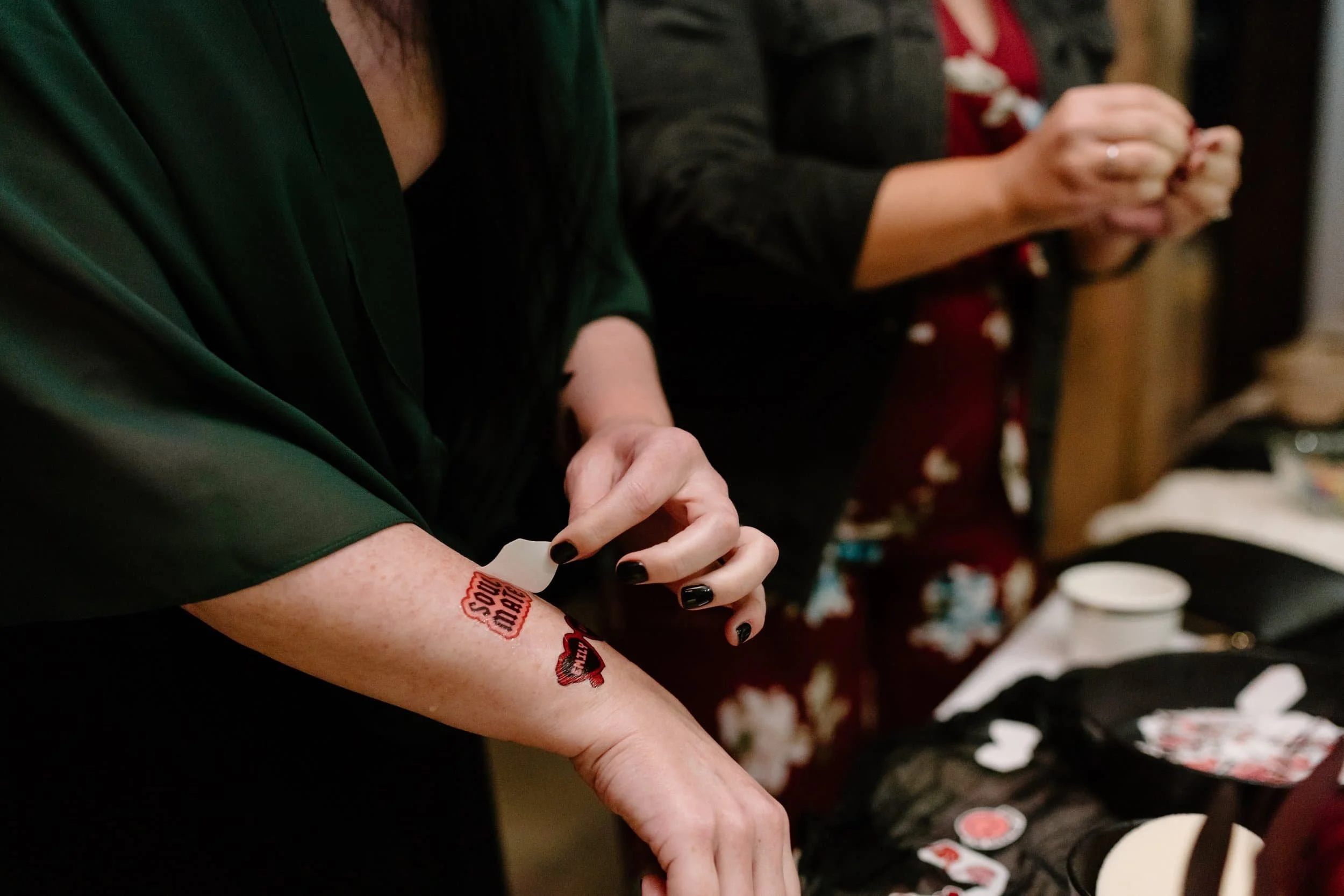 Temporary tattoo station at a wedding.