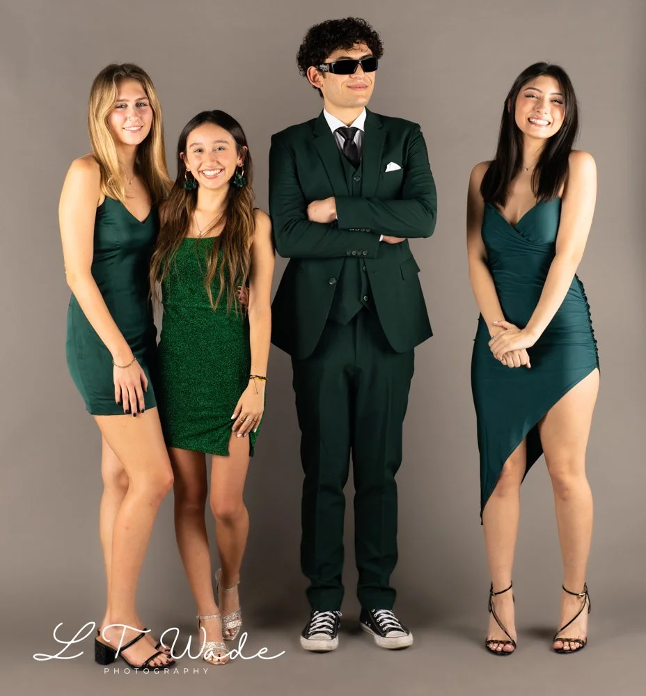 A Group Portrait Photo in clients back yard in Manama Bahrain with grey backdrop
