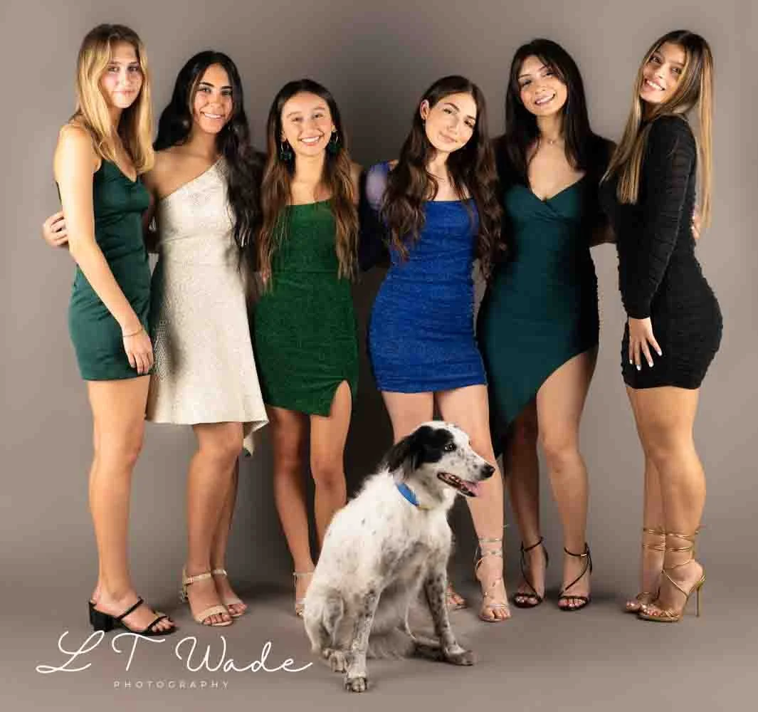 A Group Portrait Photo in clients back yard in Manama Bahrain with grey backdrop