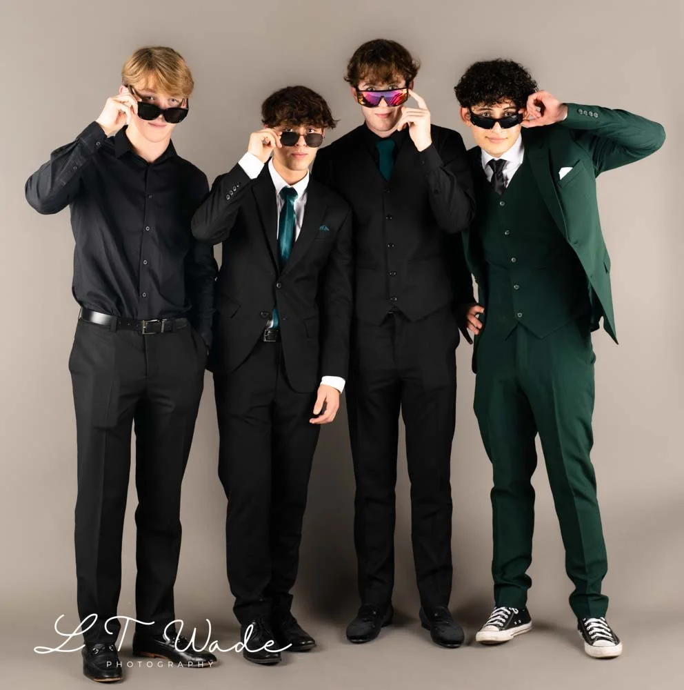 A Group Portrait Photo in clients back yard in Manama Bahrain with grey backdrop