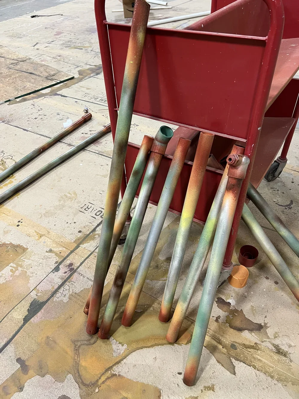 colorful urinetown pipes.webp