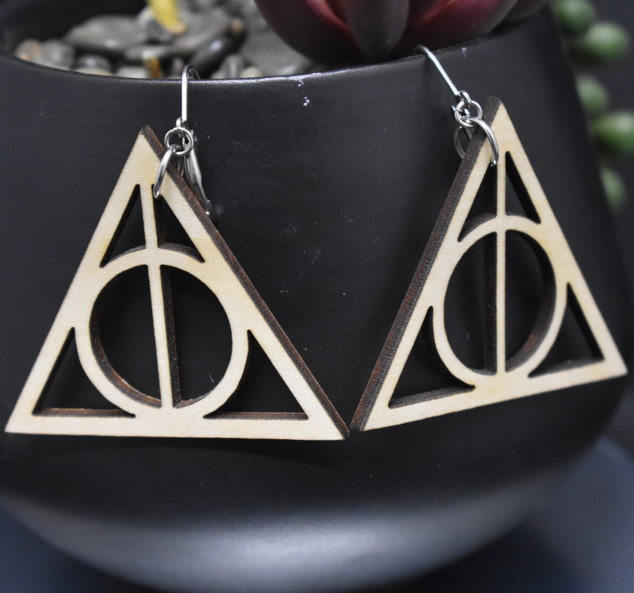 I have 3 of these Deathly Hallows earrings available and ready to ship. They are great for the Harry Potter fan in your life.
 #deathlyhallowssymbol #deathlyhallowsearring #harrypotterjewelry #harrypotterearrings #thethreebrothers #harrypotterfandom 
