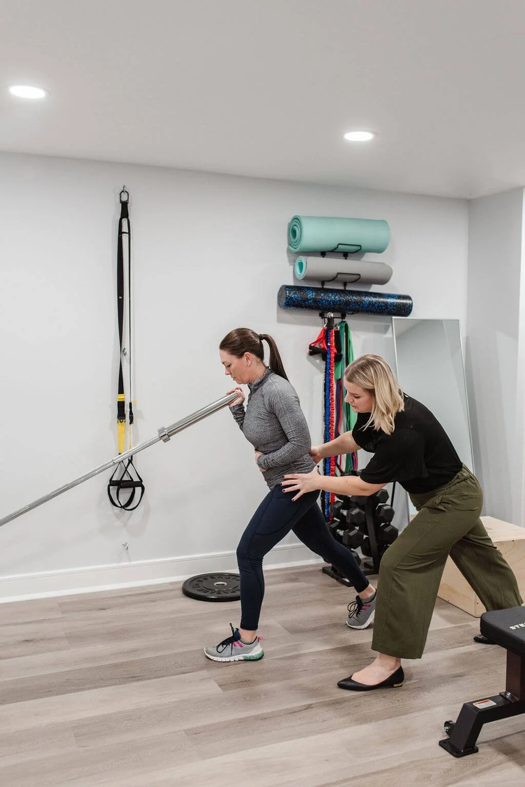A patient in perimenopause performing pelvic floor exercises in pelvic floor therapy