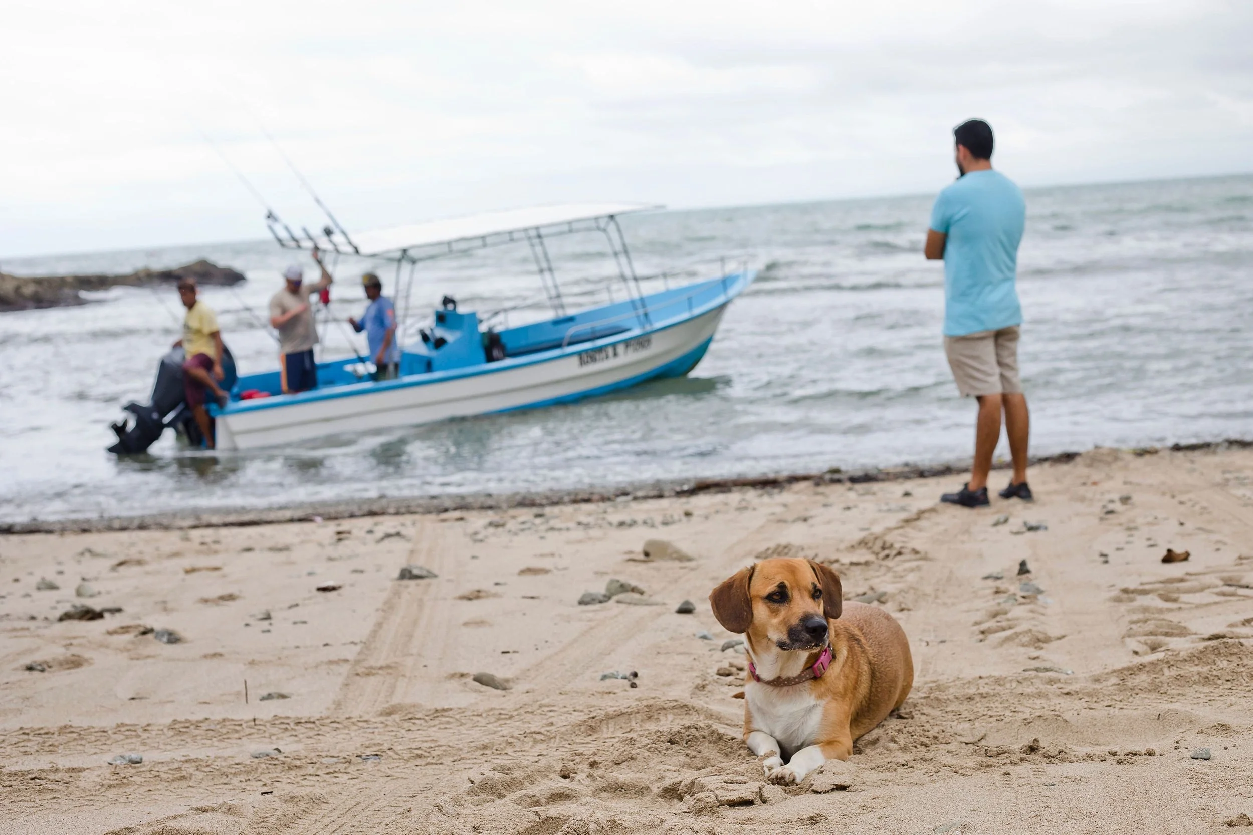 People on fishing boat at Pasha Beachfront House
