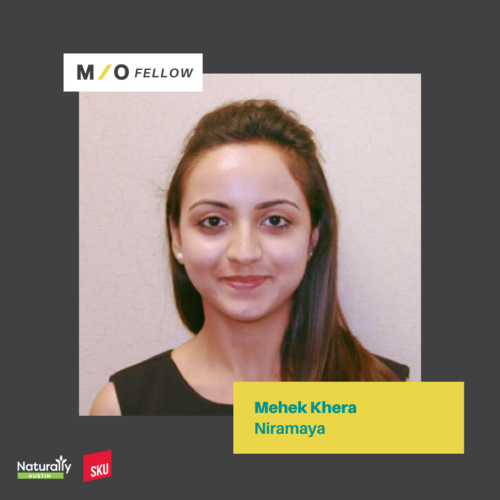 A professional headshot of a young woman with long brown hair, wearing a black sleeveless top, against a neutral background. Text indicates she is Mehek Khera Niramaya, a MO Fellow, with logos for Naturally Austin and SKU.