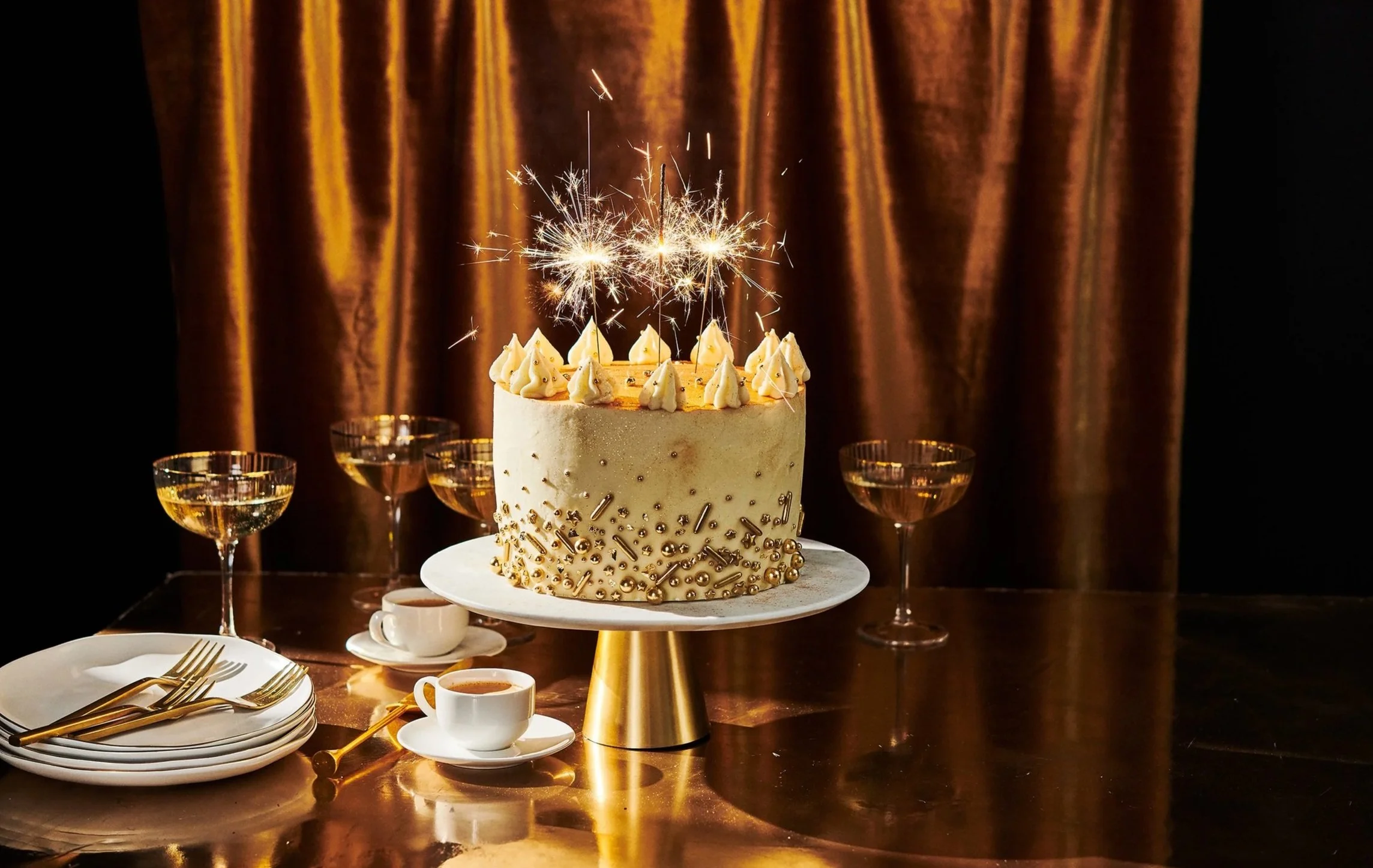 Anniversary_10_Final_Toast_Gold_Cake_0525_123496.jpg