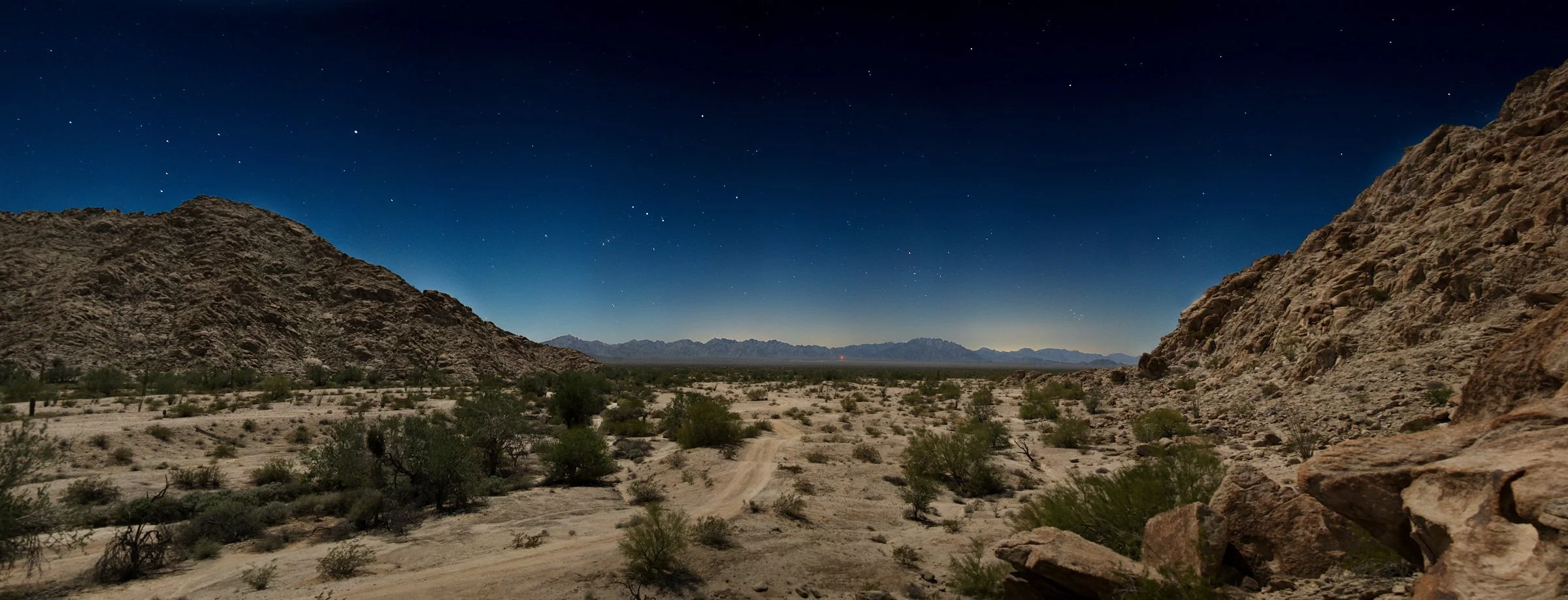  The red light is intended to serve as an emergency beacon for migrants in need of water or help. In practice it is often Border Patrol agents who respond. One night I watched agents search for illegal migrants for hours, as black helicopters flew ov