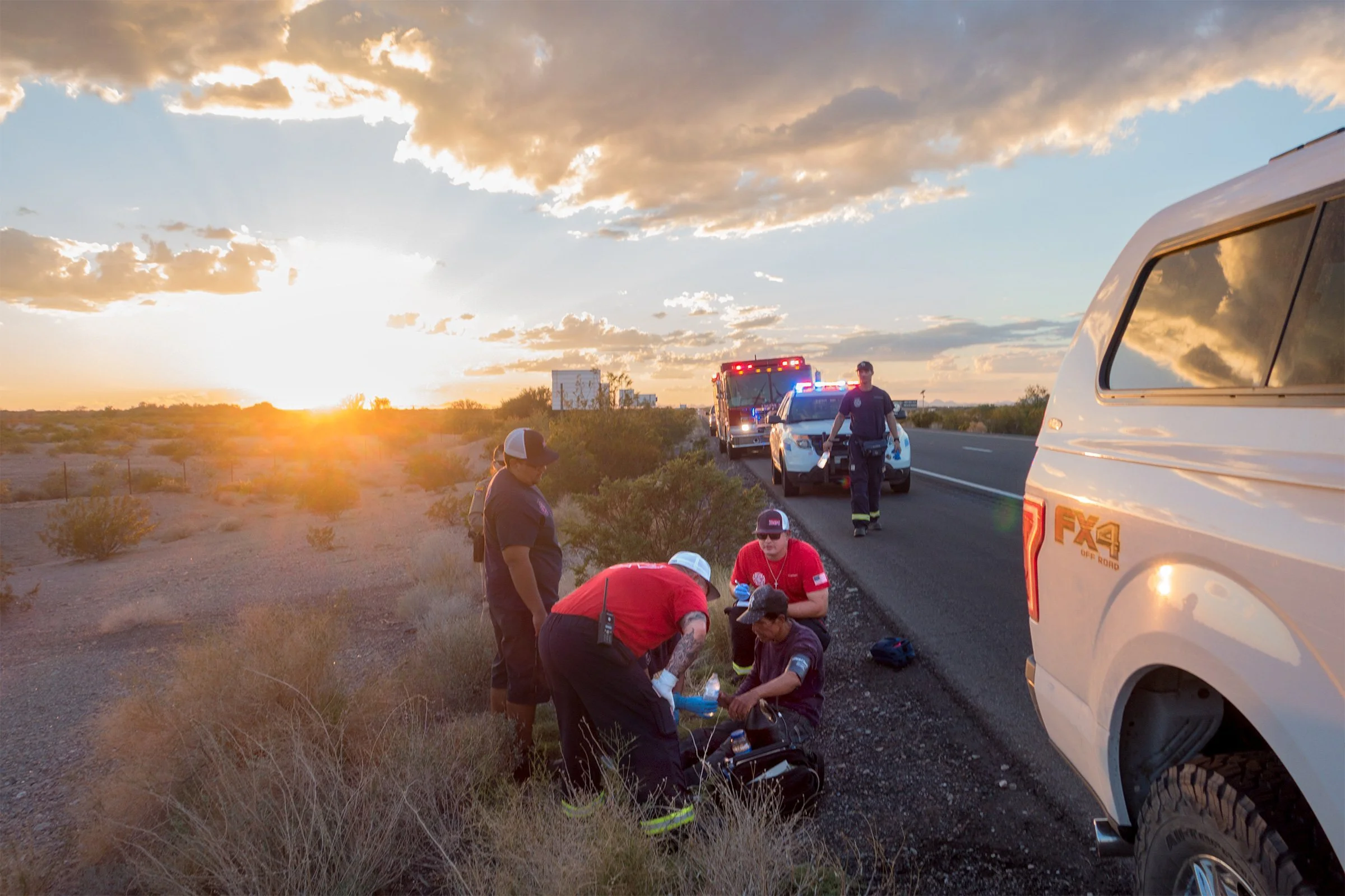  Just east of Gila Bend, on Route 8, we saw a man lying on his side on the edge of the road, waving his hat and whispering, “agua, agua.” We called 911 and the Highway Patrol arrived quickly. The officer spoke fluent Spanish, and after the man was st