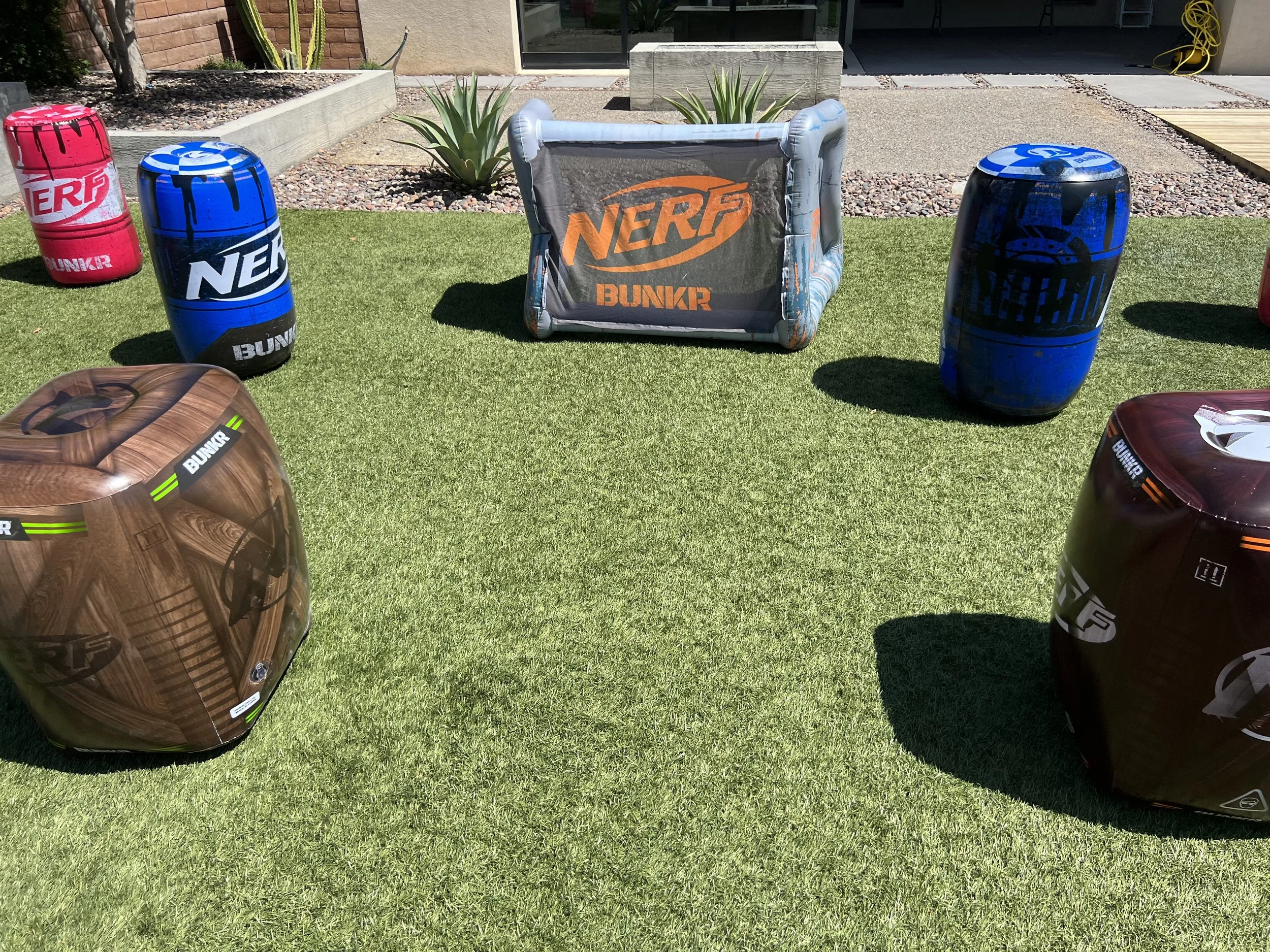 Primary SEO Alt Text "Posh Express Rentals Nerf Wars in Las Vegas. Premier party rentals and event rentals featuring mobile battle arenas, bunkers, and blasters for birthdays and corporate events.