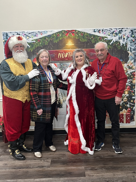 20251218 - Linda and Tony with the guests of honor.