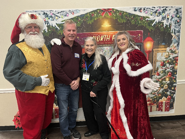 20251218 - Todd and Marcia with the guests of honor.