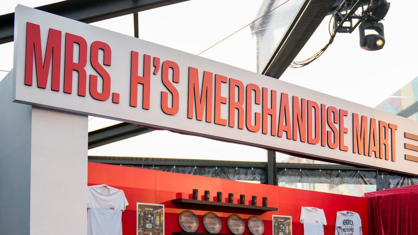 The attention to detail was unparalleled for #TeamHendrick. The custom merchandise stand featured exclusive items&mdash;cups, shirts, and posters&mdash;each thoughtfully designed to honor the client and highlight the impressive growth of the company 