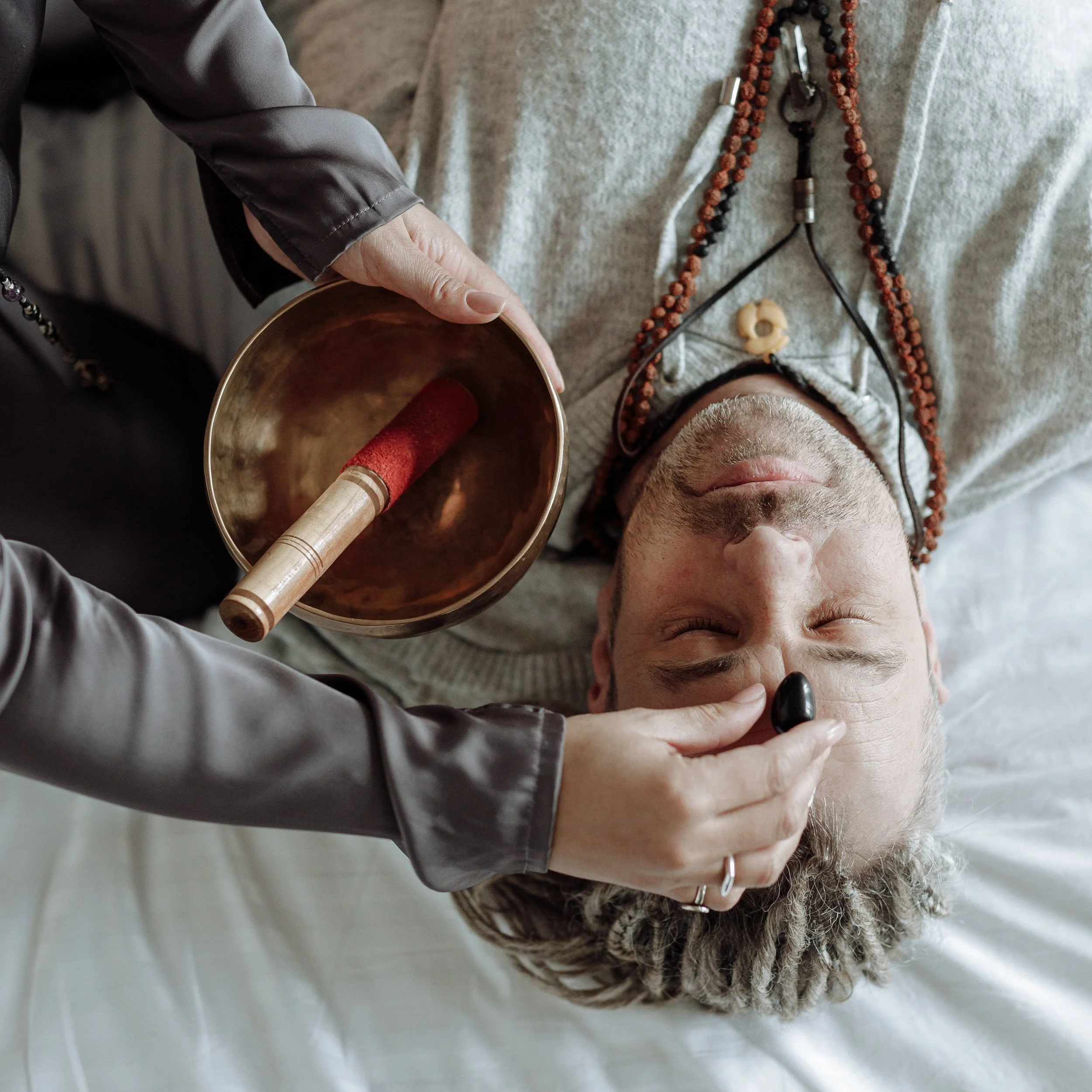 Man receiving healing wellness practice