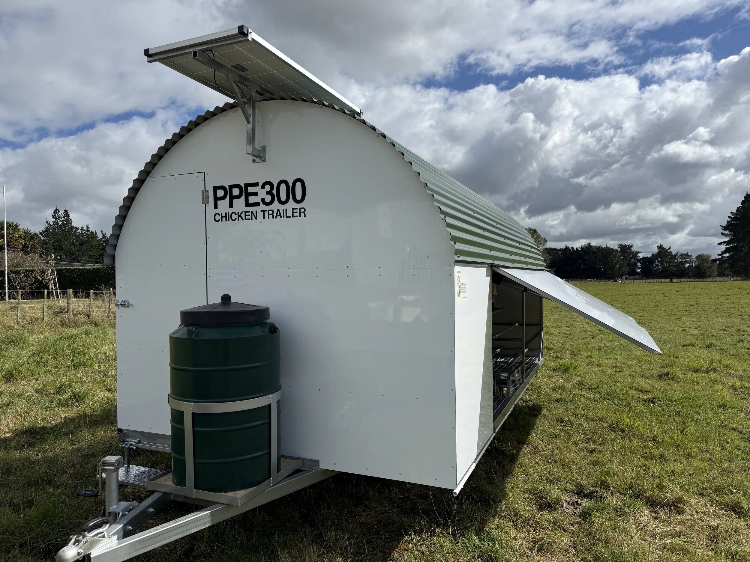 PPE300 chicken trailer showing water tank front view, open