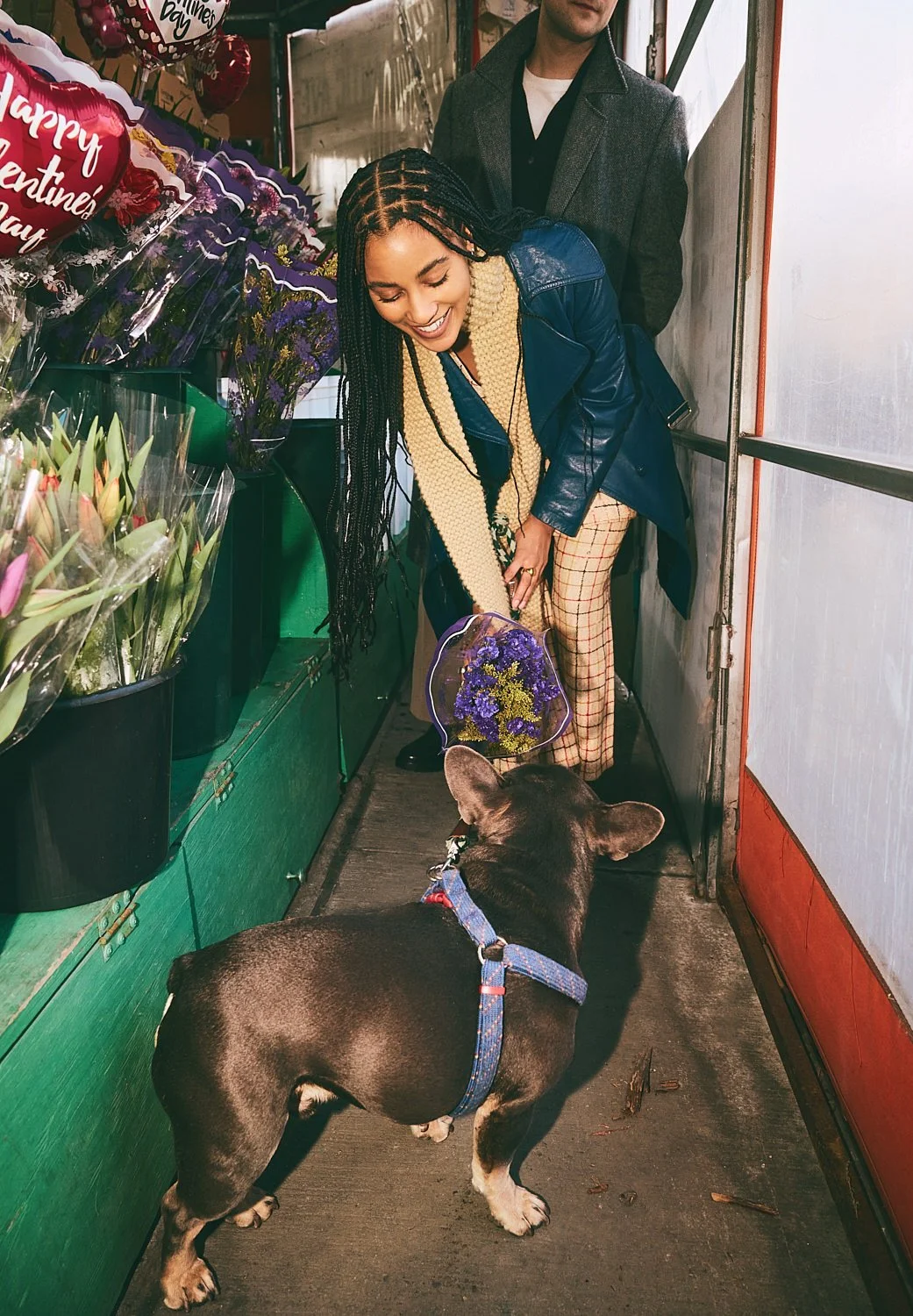 Candid lifestyle photography: couple with dog at bodega by Tara Donne, photographer & director working in NYC & LA