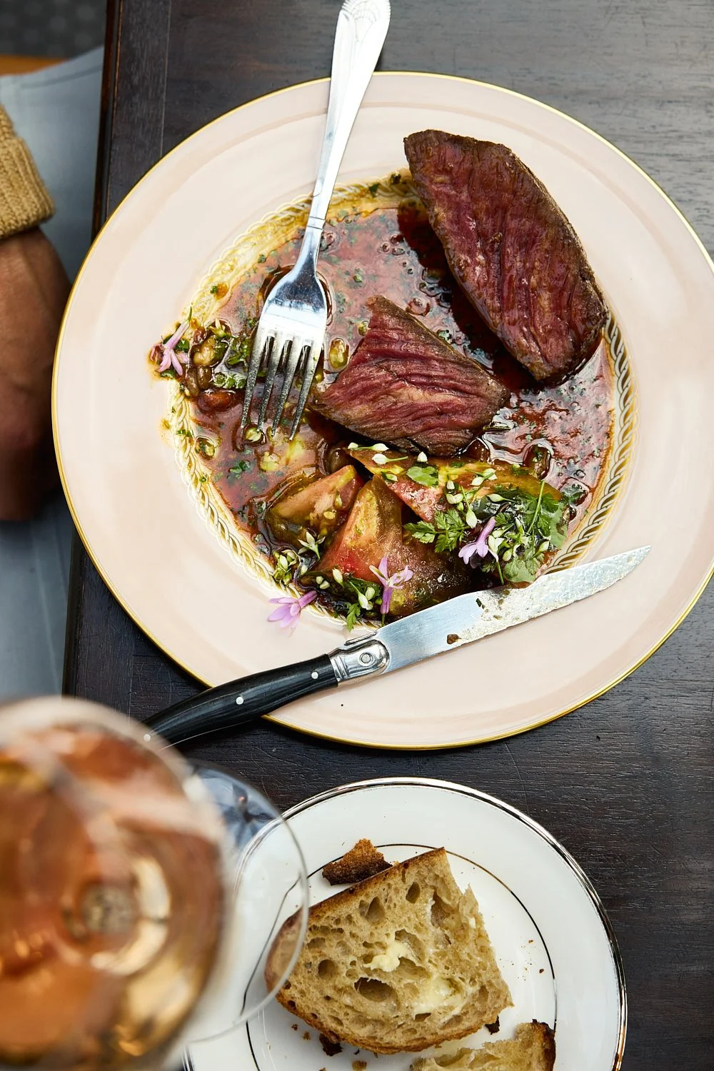 Authentic hospitality photography: guest enjoying steak at Serre Restaurant in Hudson NY by Tara Donne, photographer & director working in NYC & LA