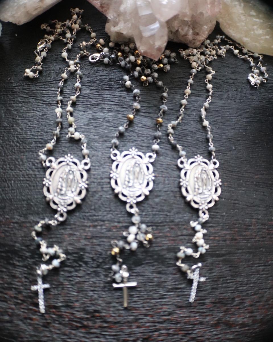Dendritic Opal with Our Lady of Lourdes and a CZ silver cross 

Dendritic Opal, Pyrite, with Our Lady of Lourdes and a CZ silver cross 

Opal can turn your world upside down in a good way!  It can help to stimulate originality and creativity release 