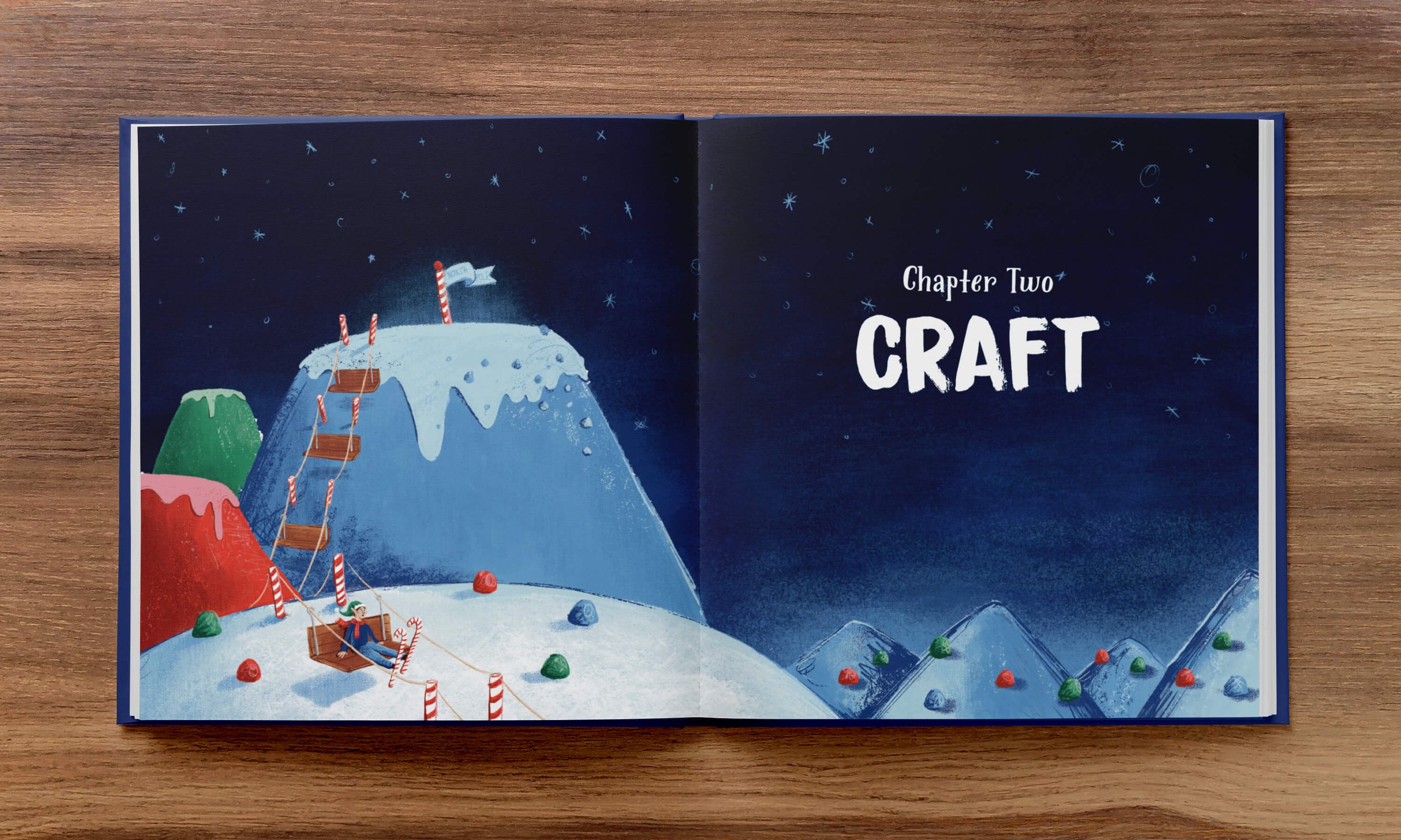 An open book on a wooden surface with a colorful illustration of a whimsical snow-covered landscape made of gumdrop mountains. the left page shows a scene with a ski lift going up a cliff, ridden by an elf in candy cane skis, and the right page read