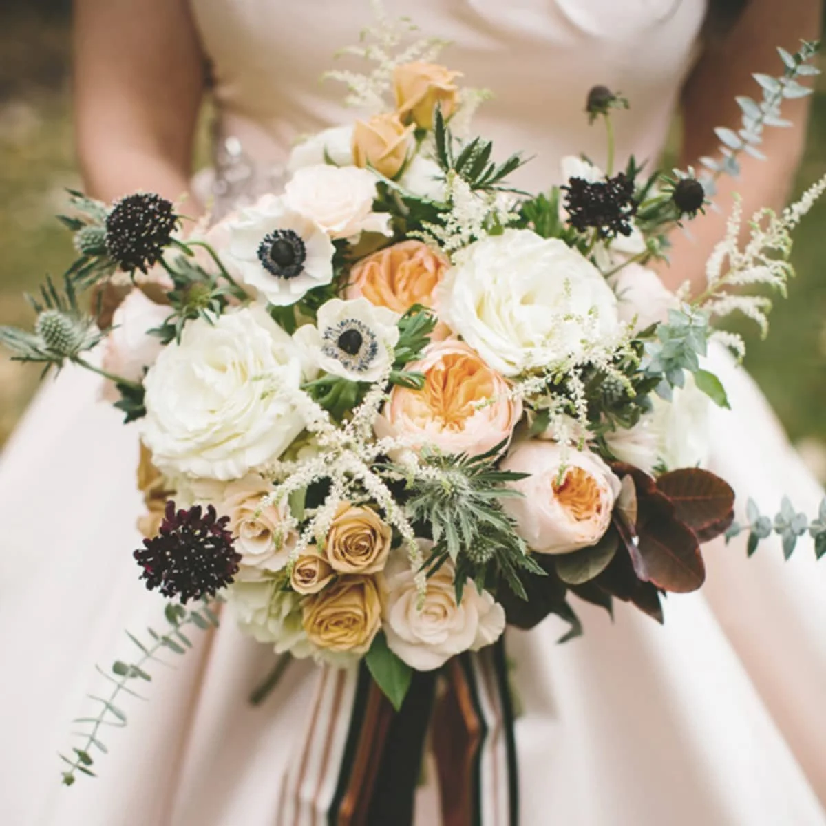 Bride holding bouquet at Four Seasons wedding