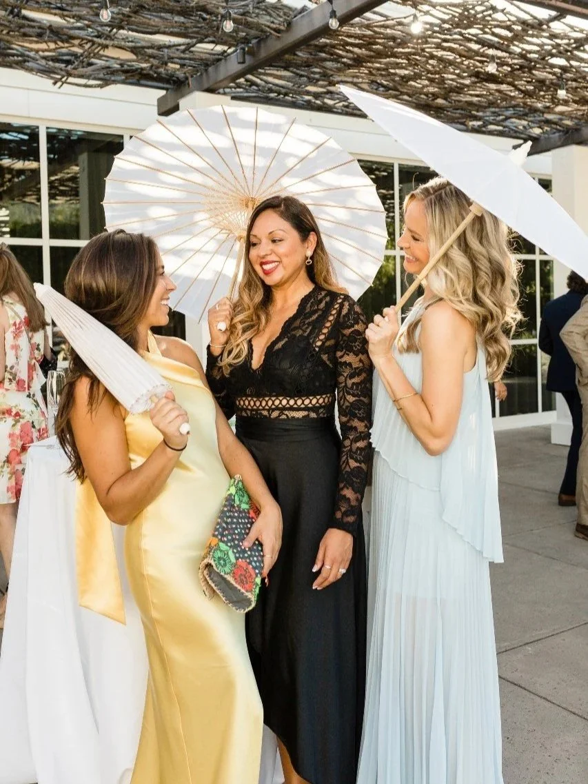 Soalge Auberge Napa wedding guests with parasols