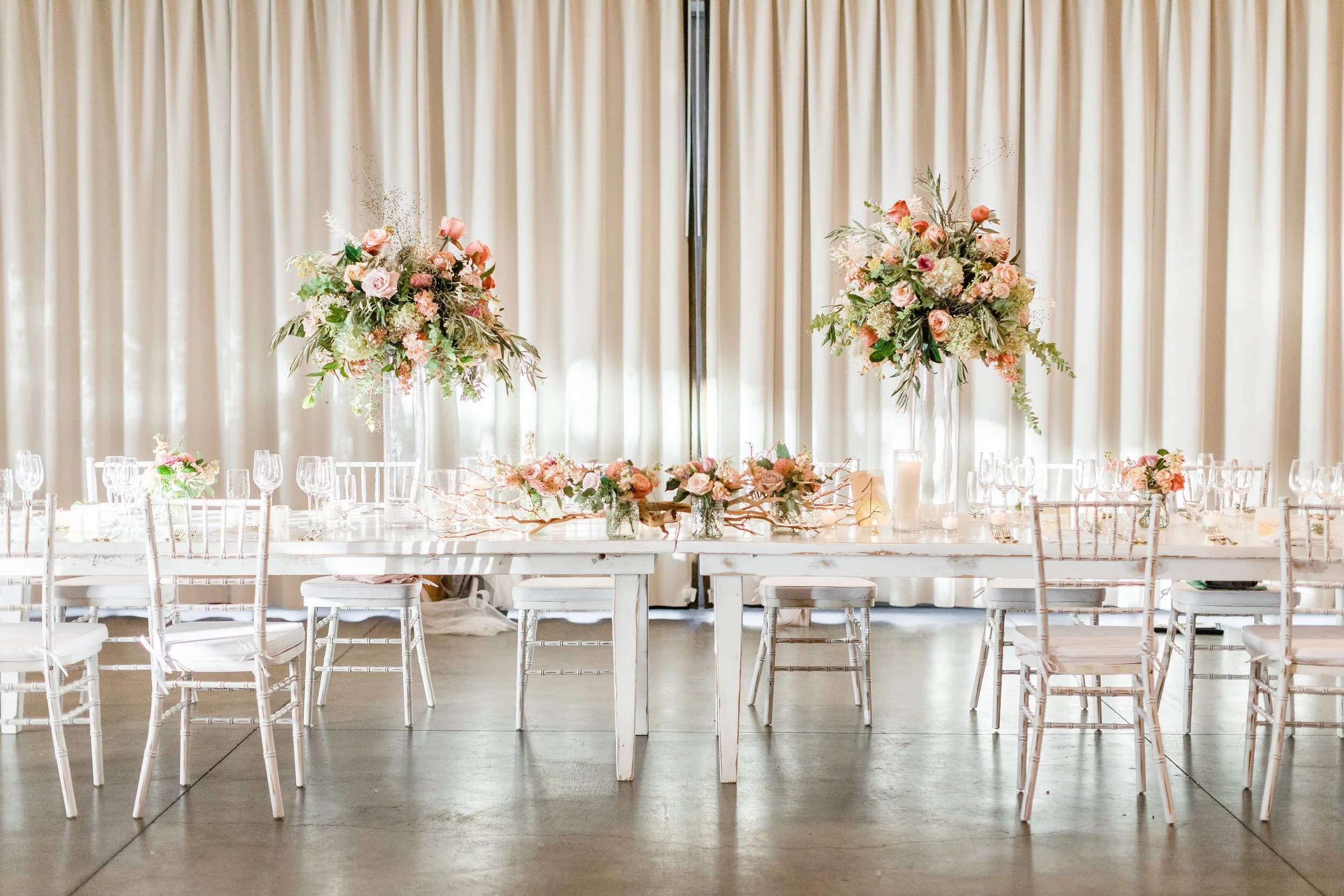 Solage Auberge Wedding Reception Head Table with Tall Centerpieces
