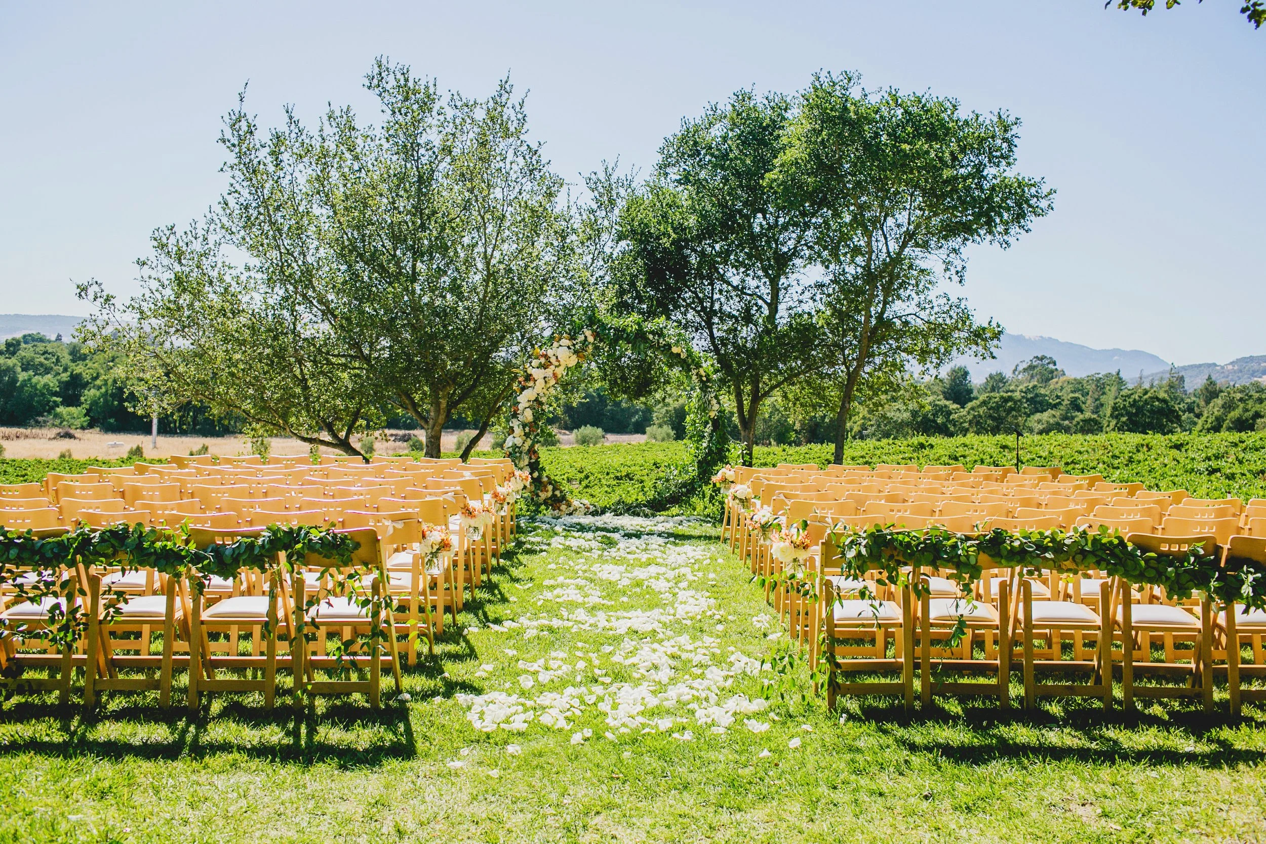 Gundlach Bundschu wedding ceremony site with rounded floral altar