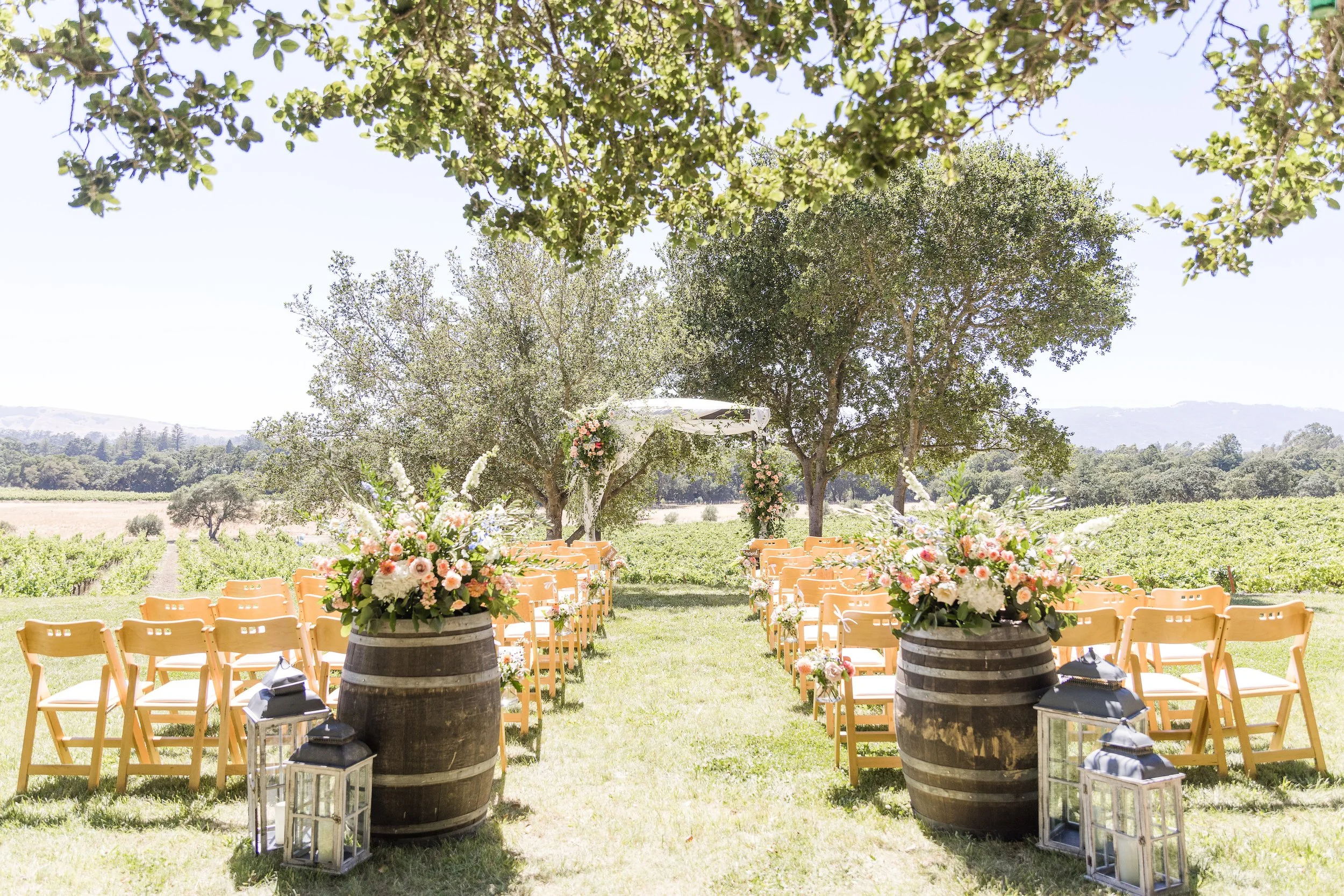 Gundlach Bundschu winery wedding ceremony with wine barrels