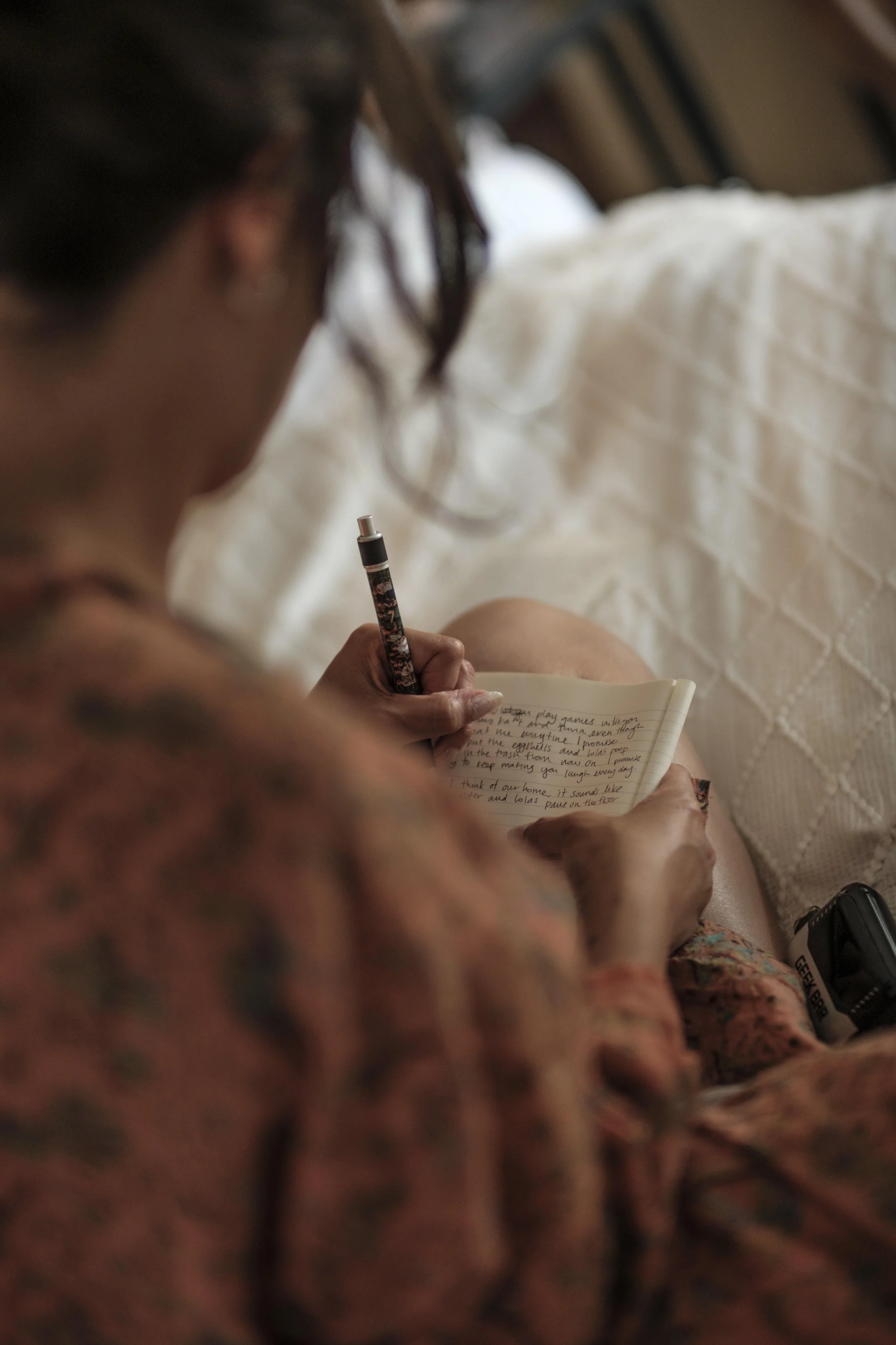 Open notebook with handwriting and pen in warm natural lighting-Design mood Five no regret checks working harder than any second opinion