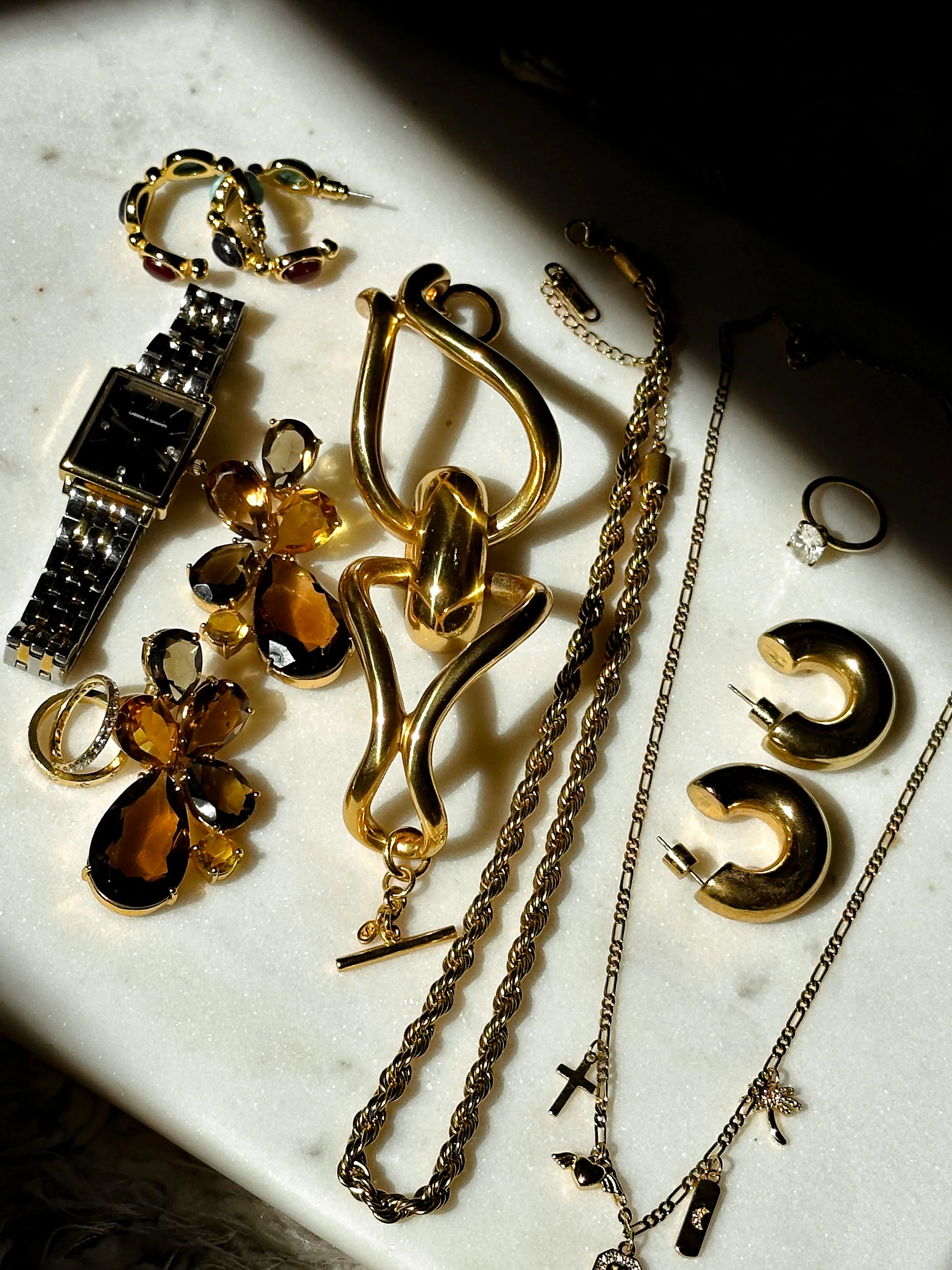 Personal jewelry collection on marble surface-Design Mood True Filter personal recognition system by ardisenostudio