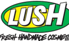LUSH logo with green and white text and a black underline.