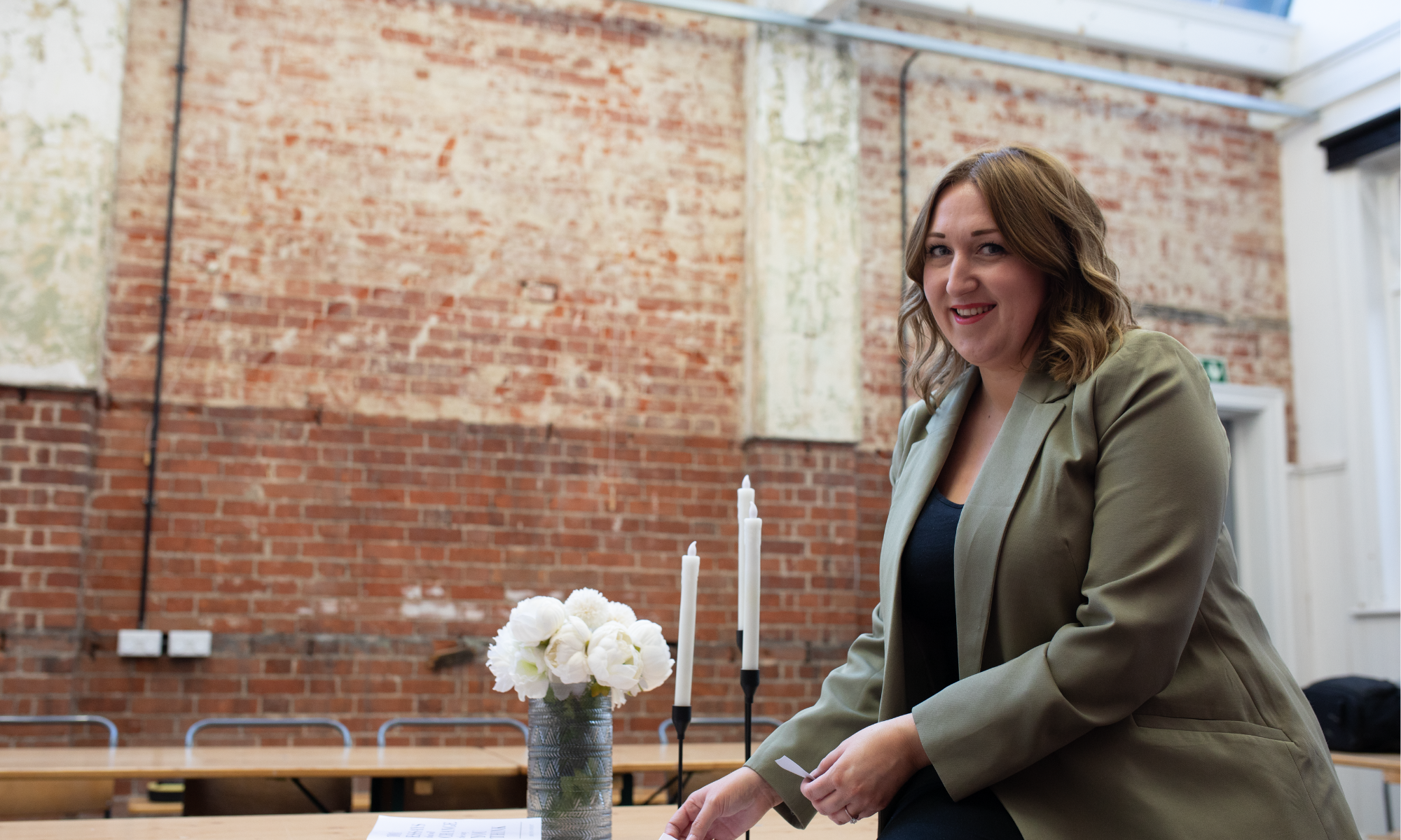 carly-desk-sitting-banner.png
