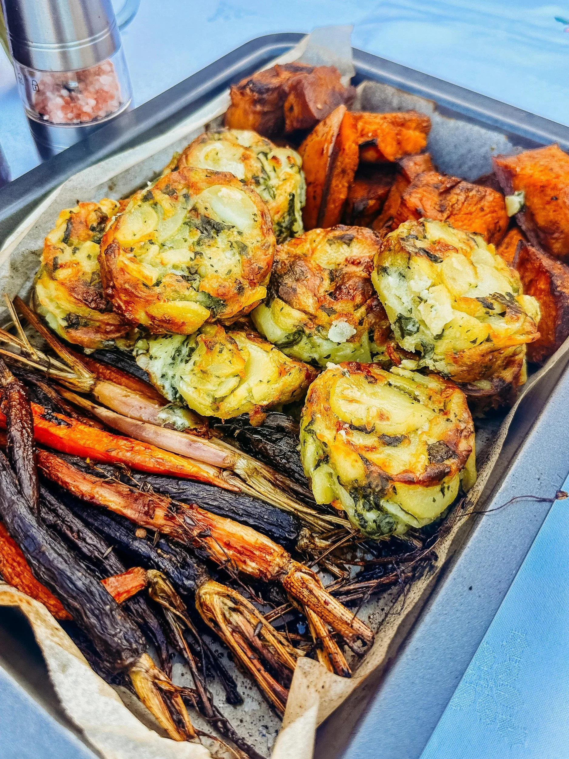 Tray of potato gratin, roast pumpkin and honey-roasted carrots from the La Casetta Gourmet Christmas Feast