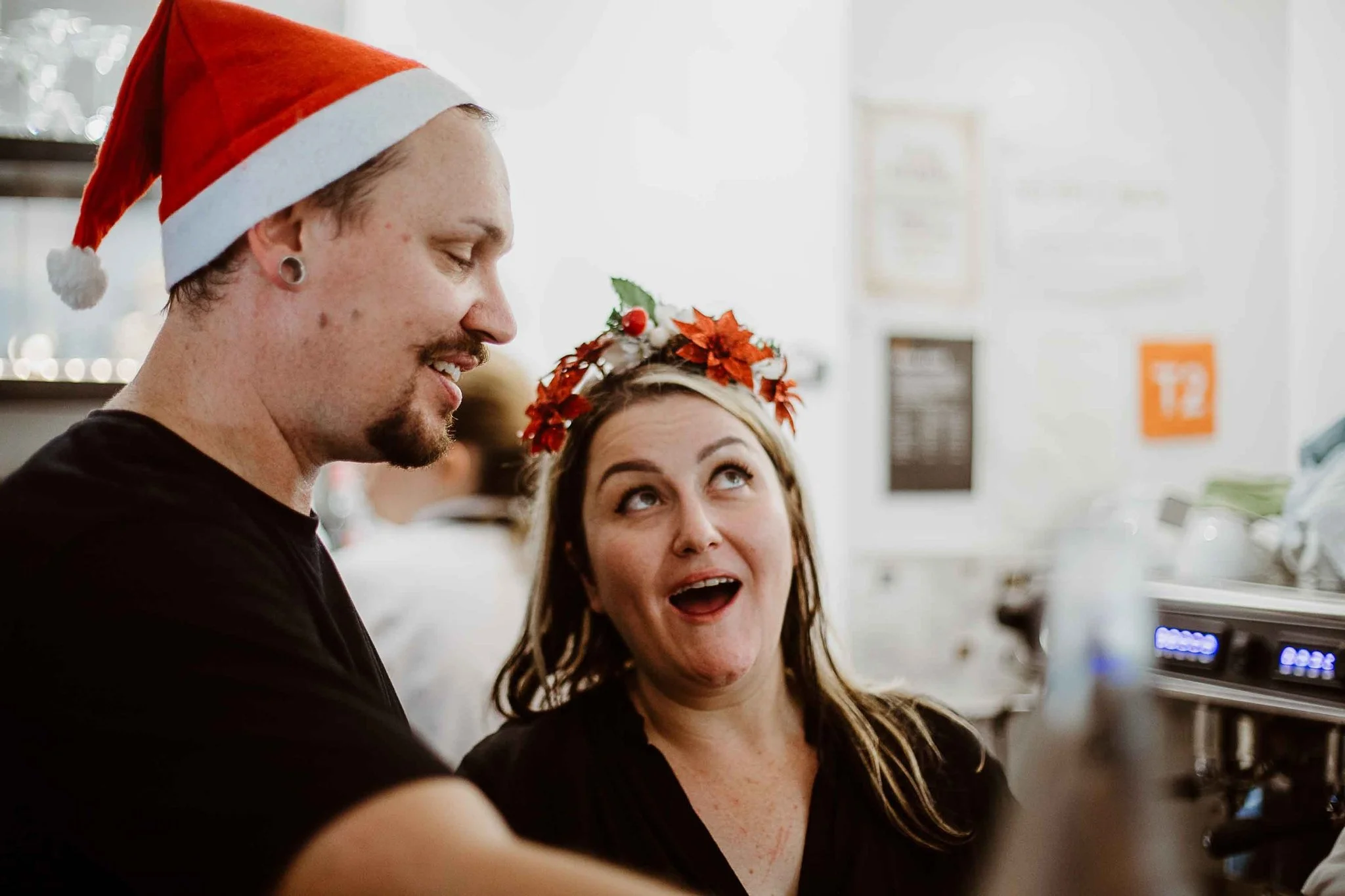 Couple in a Santa hat and festive headband celebrating Christmas at La Casetta