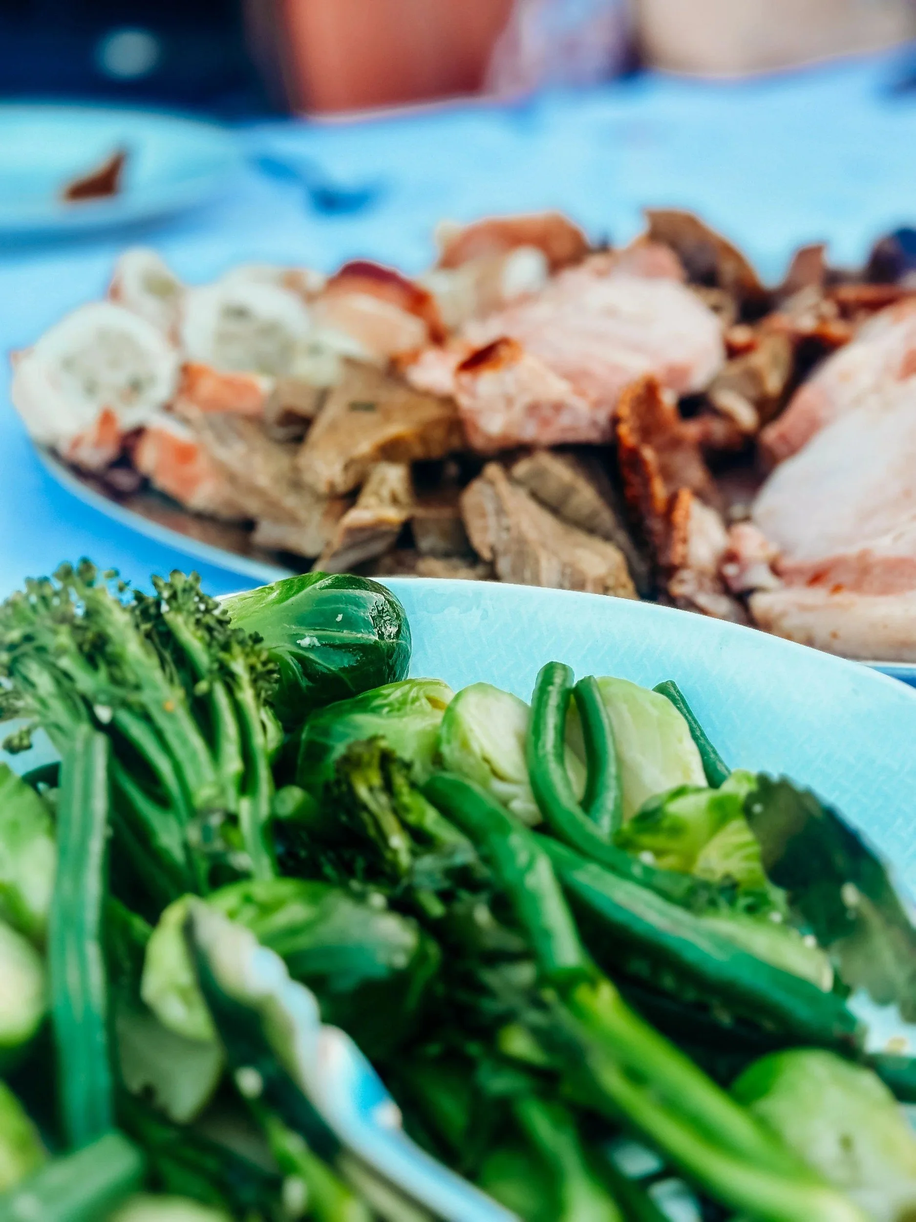 La Casetta Christmas Roast with sliced roast meats and garlic greens