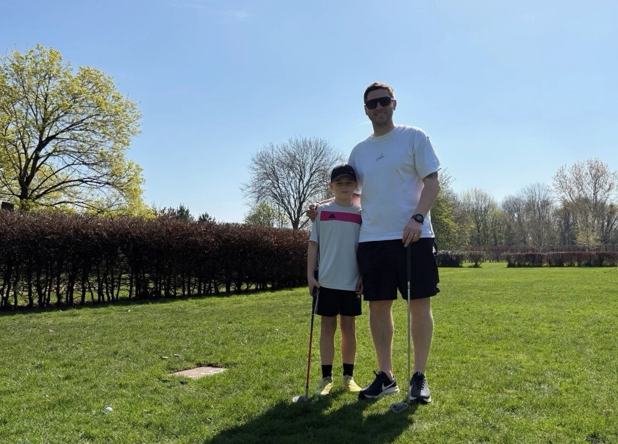 Father and son Paul Rough and Jamie, who were among the first customers of the 2026 season to tee off in the spring sunshine.
